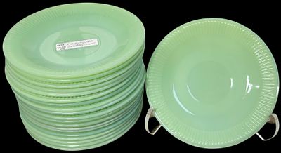 Seventeen Jadeite Glass Saucers in the Jane Ray Pattern Attributed to Fire-King. A set of 