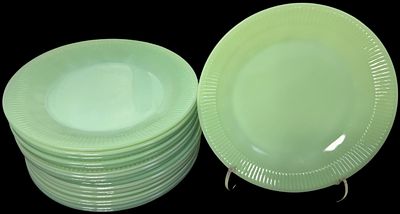 Jadeite Ribbed Rim Glass Dinner Plates. dinner plates manufactured from opaque green glass 