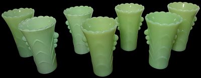 Set of Seven Mid-Century Jadeite Glass Florist Vases Attributed to Anchor Hocking. A set of 