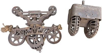 Antique Myers Cast Iron Hay Trolley and Hog Oiler. A Myers Clover Leaf unloader hay trolley and 