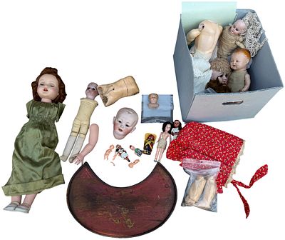 A Collection of Antique and Vintage Dolls, Doll Parts, Textiles, and Decorative Items. This lot 