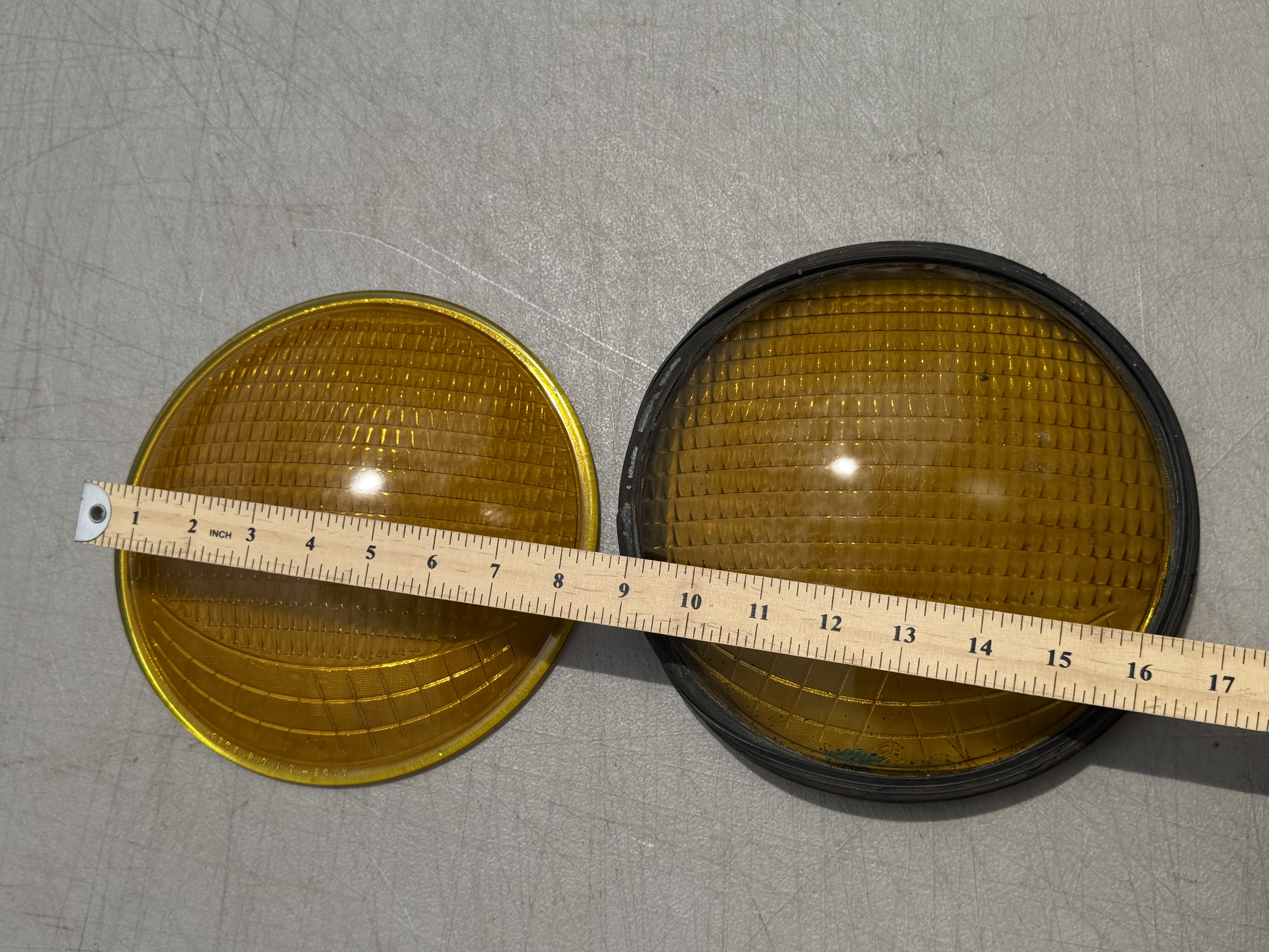 A Pair of Vintage Amber Glass Traffic Signal Lenses, Crouse-Hinds Part Number 553400