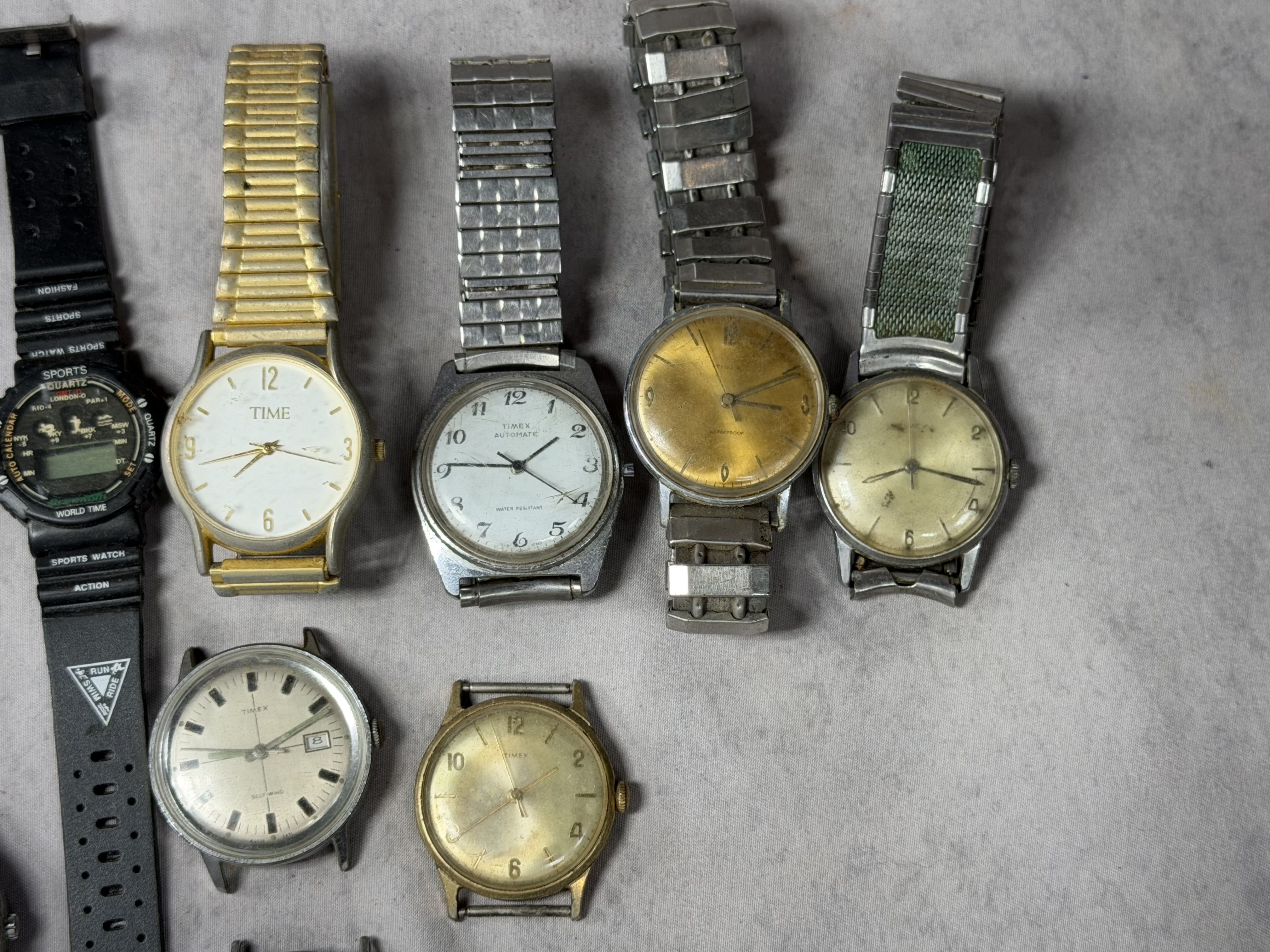 A Collection of 12 Vintage and Contemporary Wristwatches Predominantly by Timex