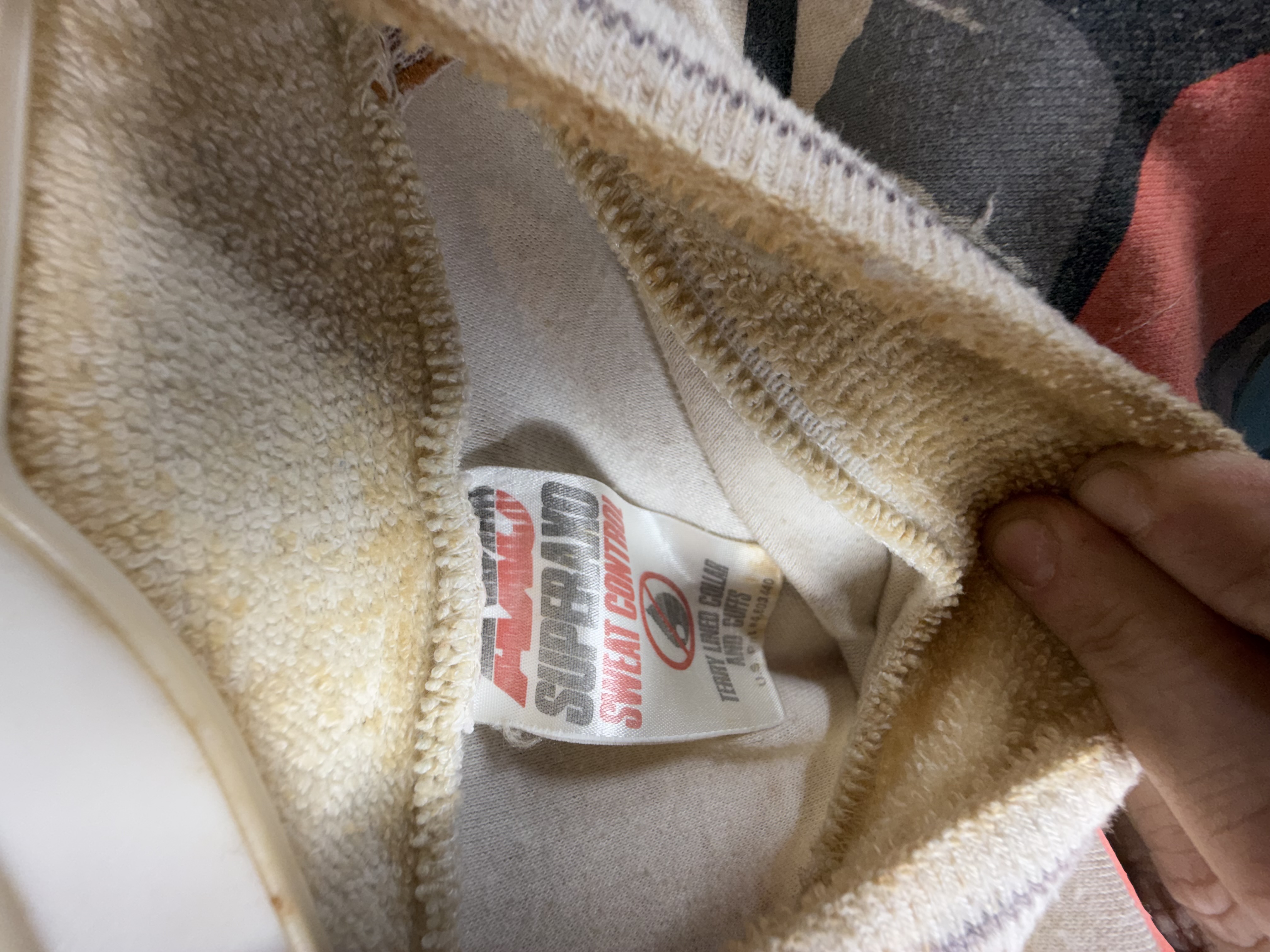 A Collection of Five Vintage AXO Sport Motocross Racing Jerseys and Pants Including Damon Bradshaw Edition Items
