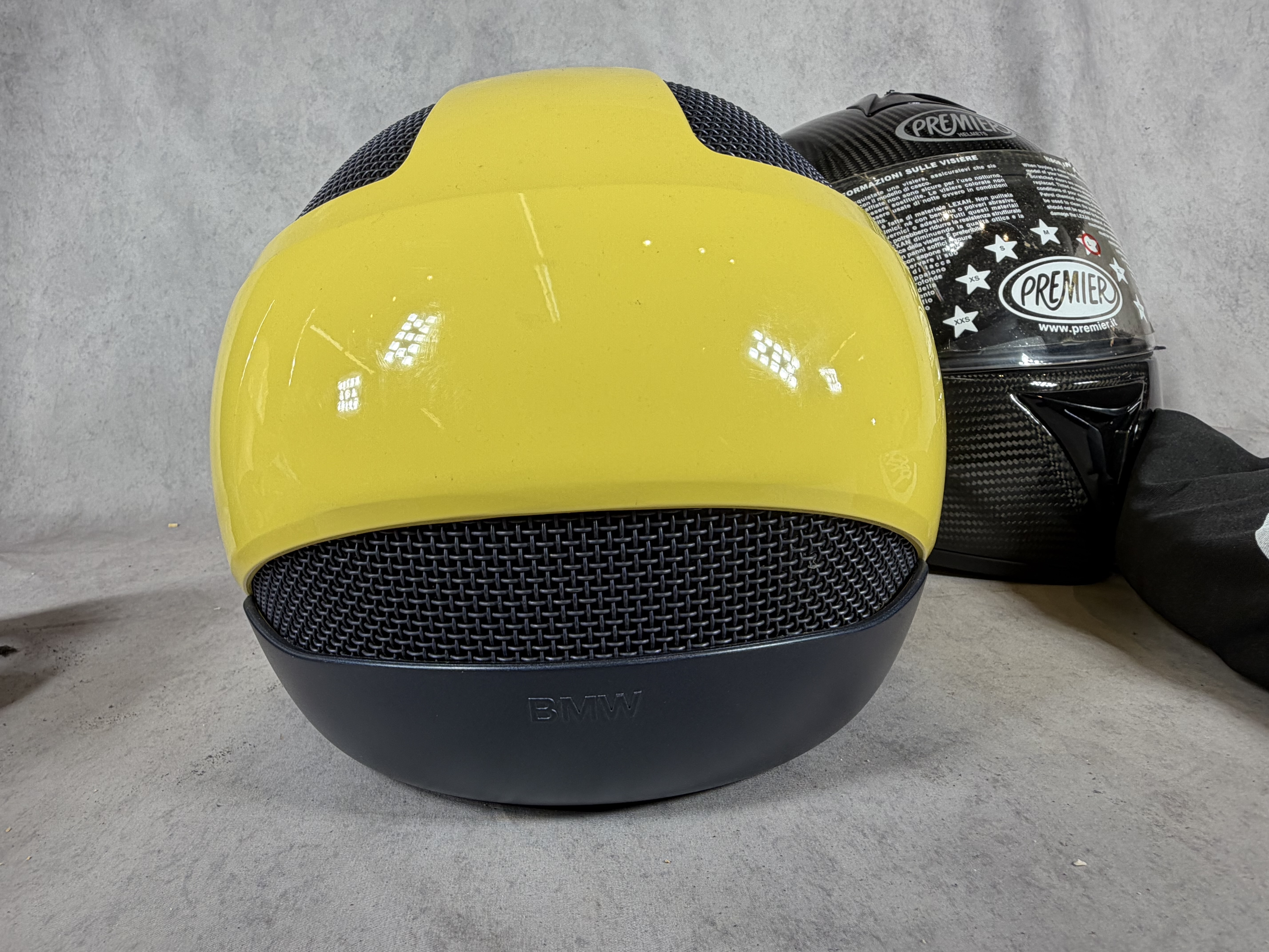An Assortment of Sporting and Motorcycle Safety Gear Including BMW and Premier Helmets and Goggles