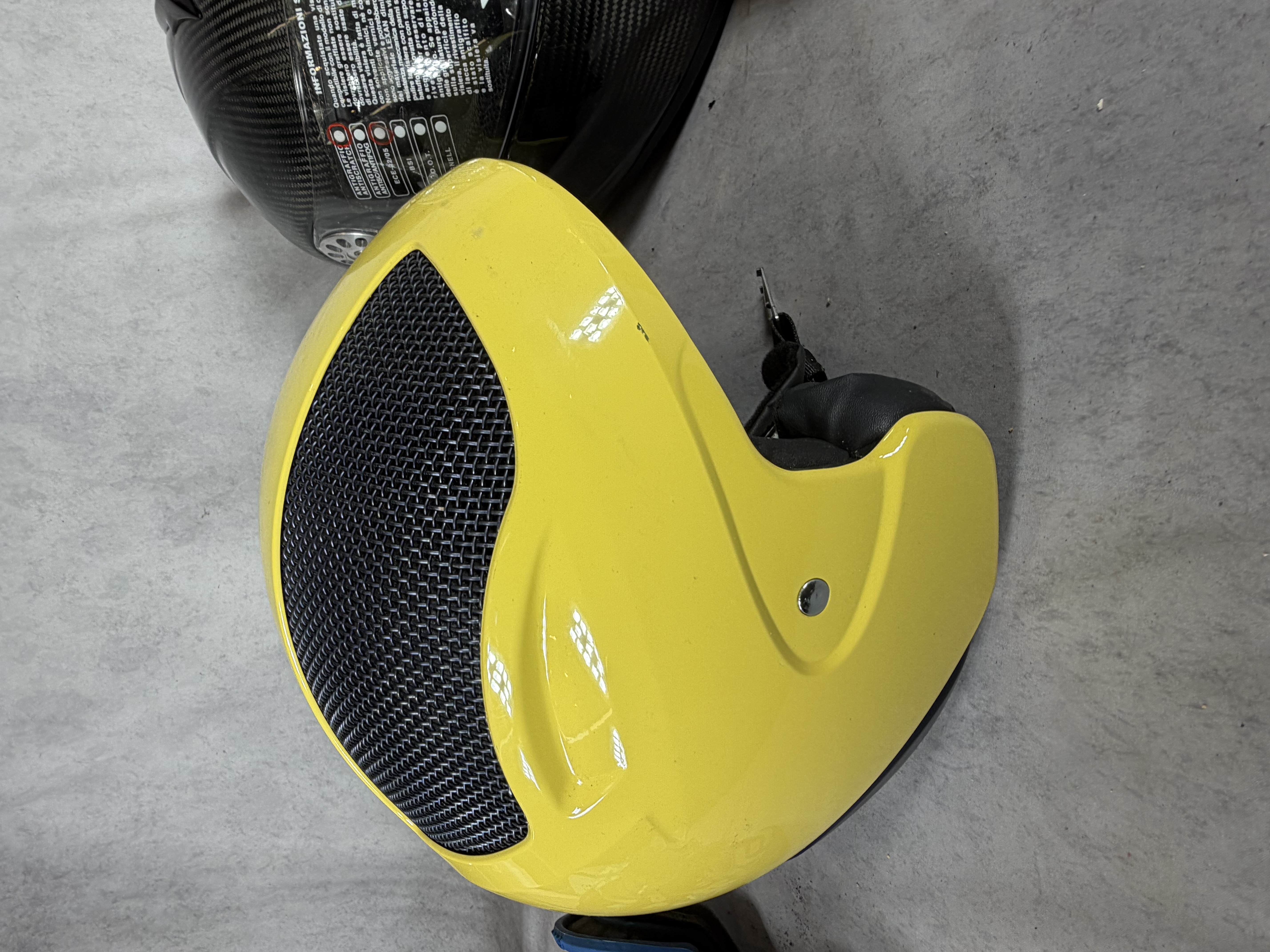 An Assortment of Sporting and Motorcycle Safety Gear Including BMW and Premier Helmets and Goggles
