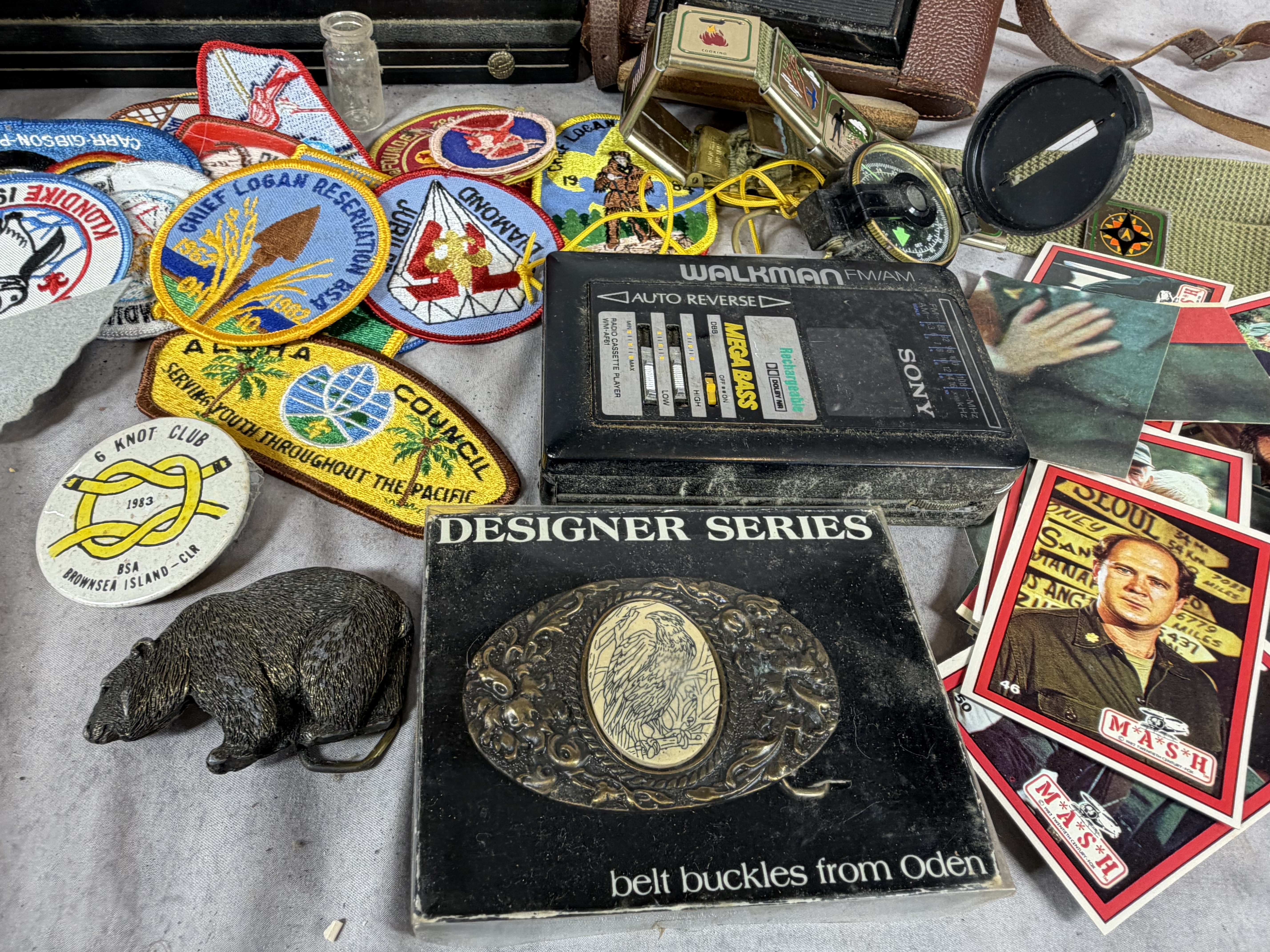 An Assortment of Vintage Scouting Memorabilia, Sony Walkman, and Various Collectibles
