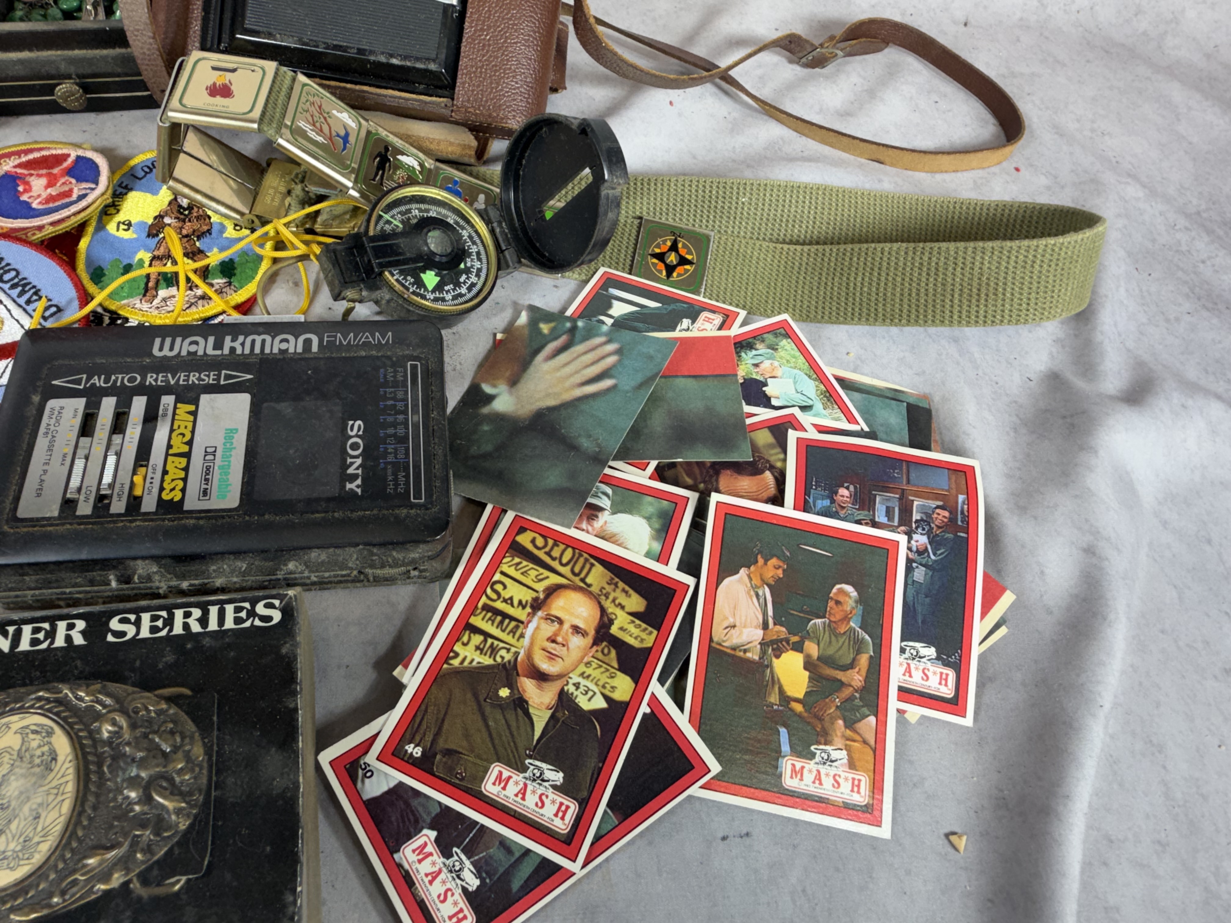 An Assortment of Vintage Scouting Memorabilia, Sony Walkman, and Various Collectibles