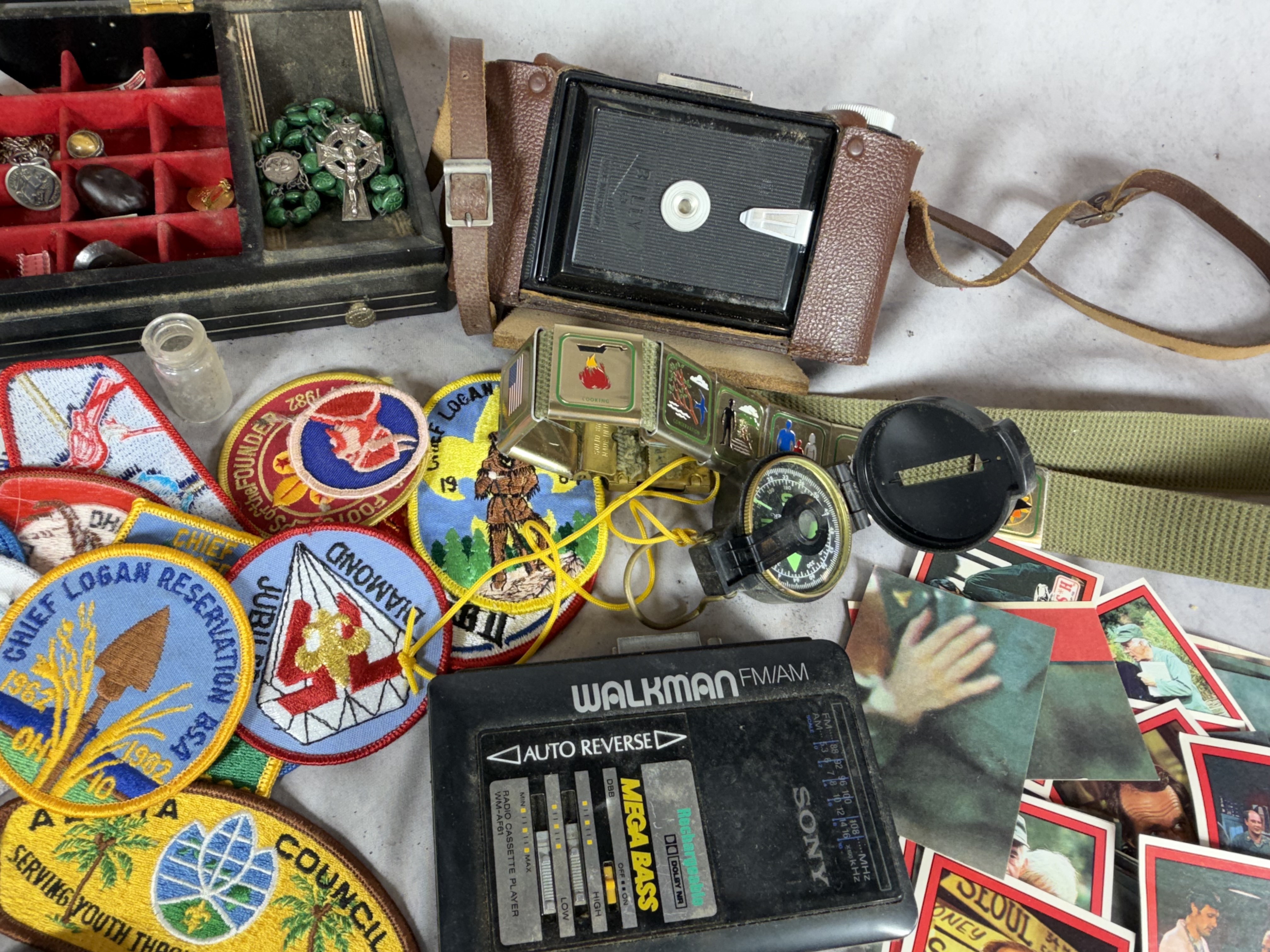 An Assortment of Vintage Scouting Memorabilia, Sony Walkman, and Various Collectibles