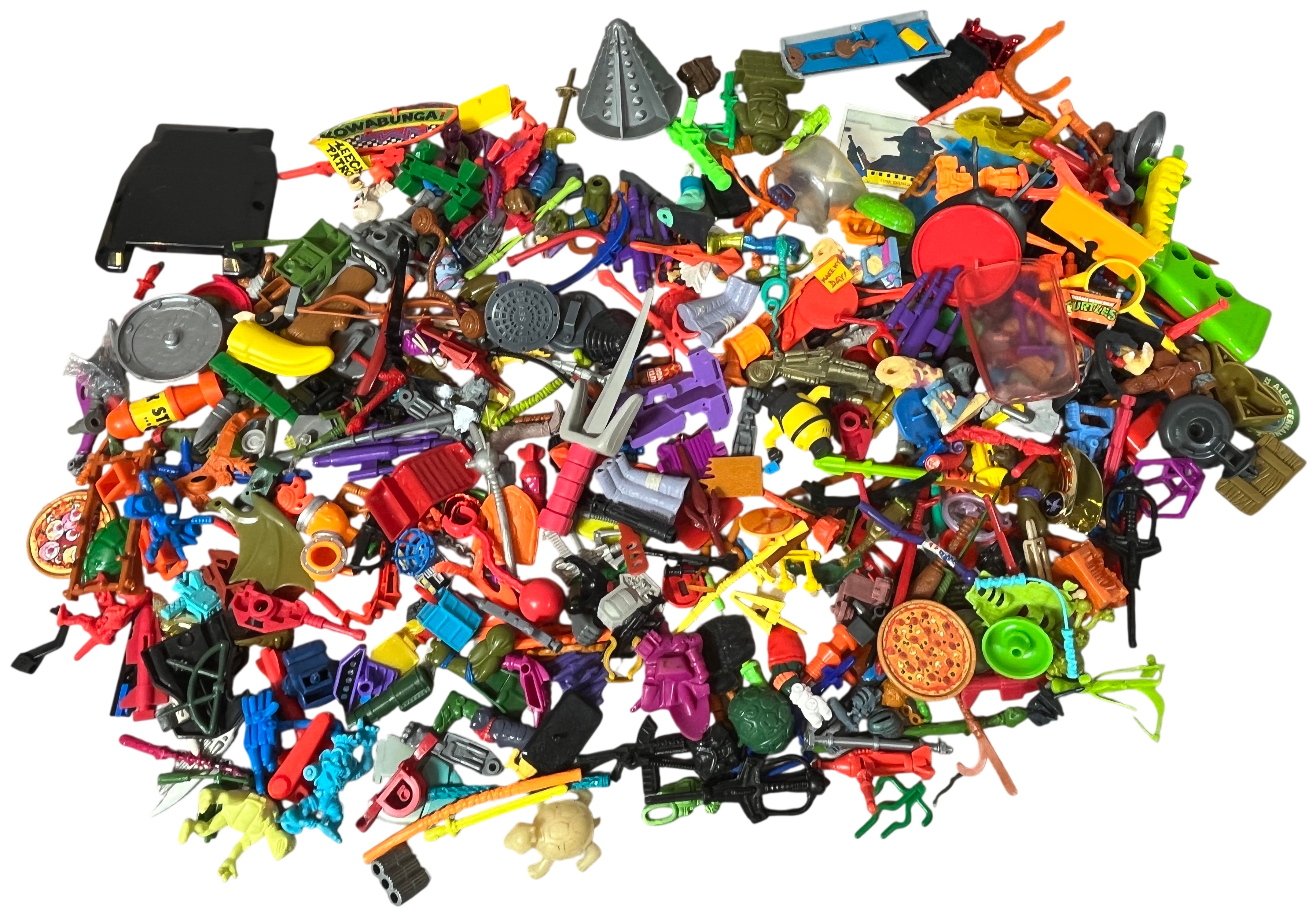 A Collection of Vintage Teenage Mutant Ninja Turtles and Contemporary Action Figure Accessories and Parts