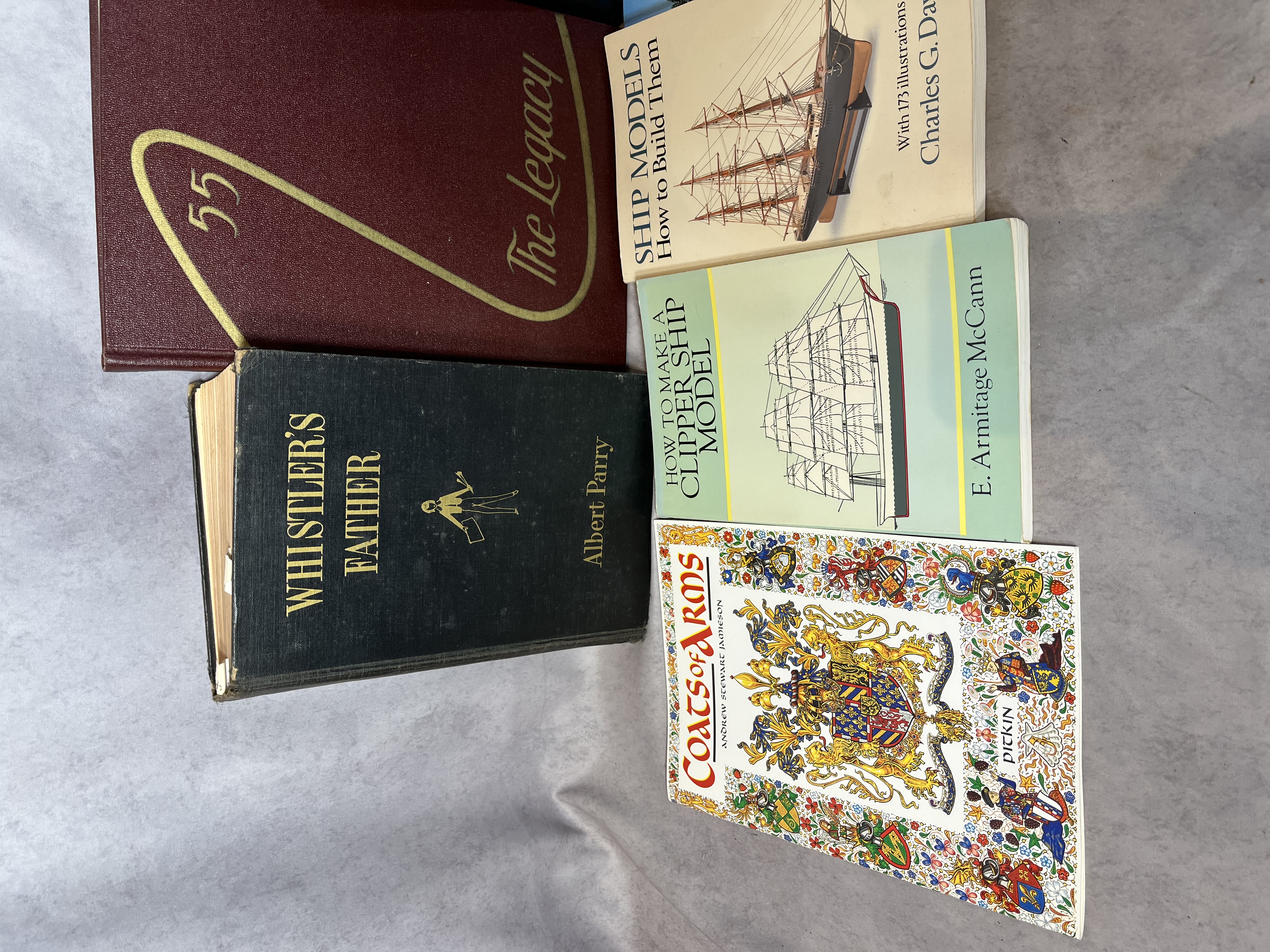 A Collection of Books and Ephemera including Art History, Maritime Modeling, and Collegiate Interests. (DJ)