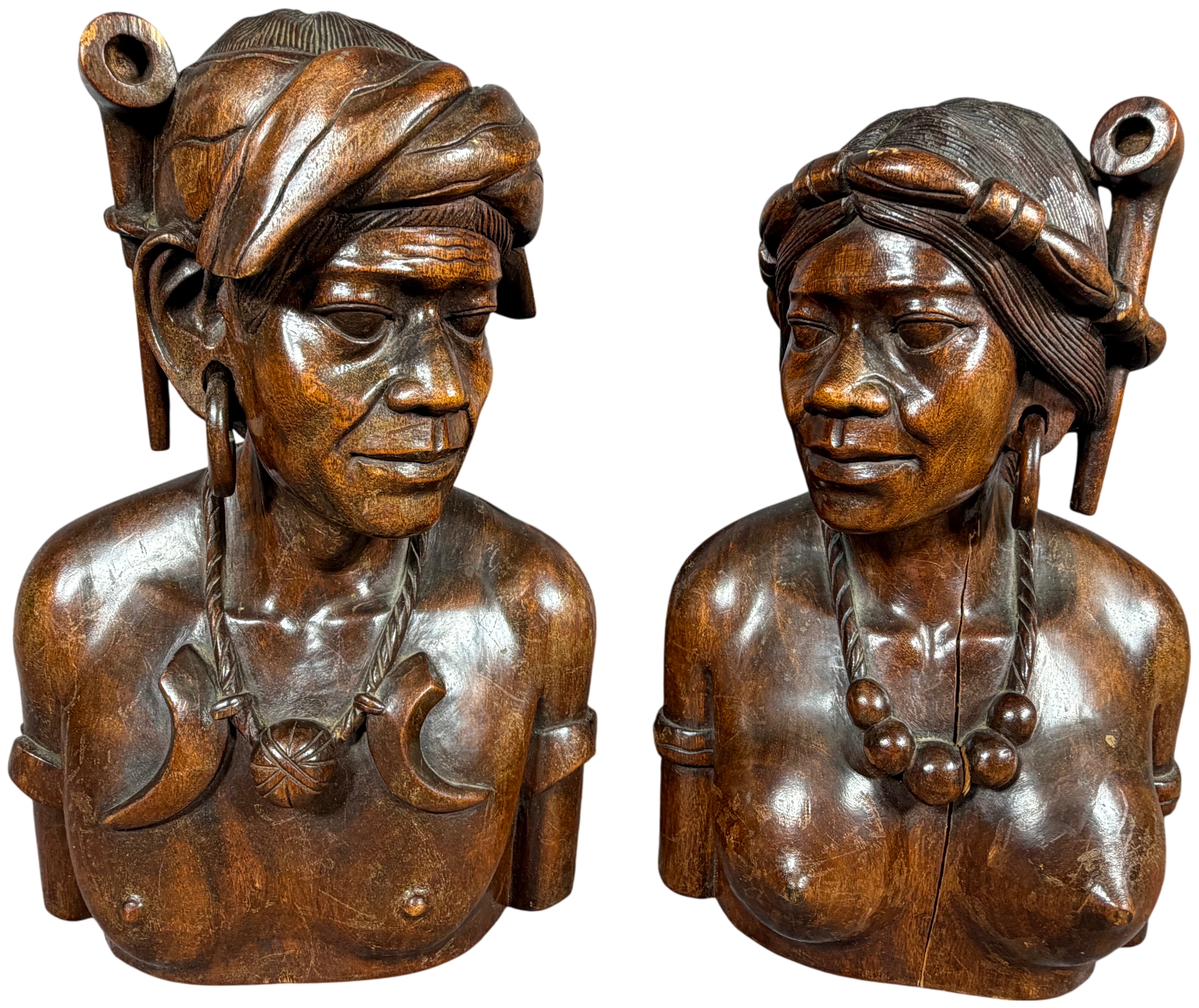 A Pair of Carved Hardwood Tribal Busts in the Style of Igorot Folk Art