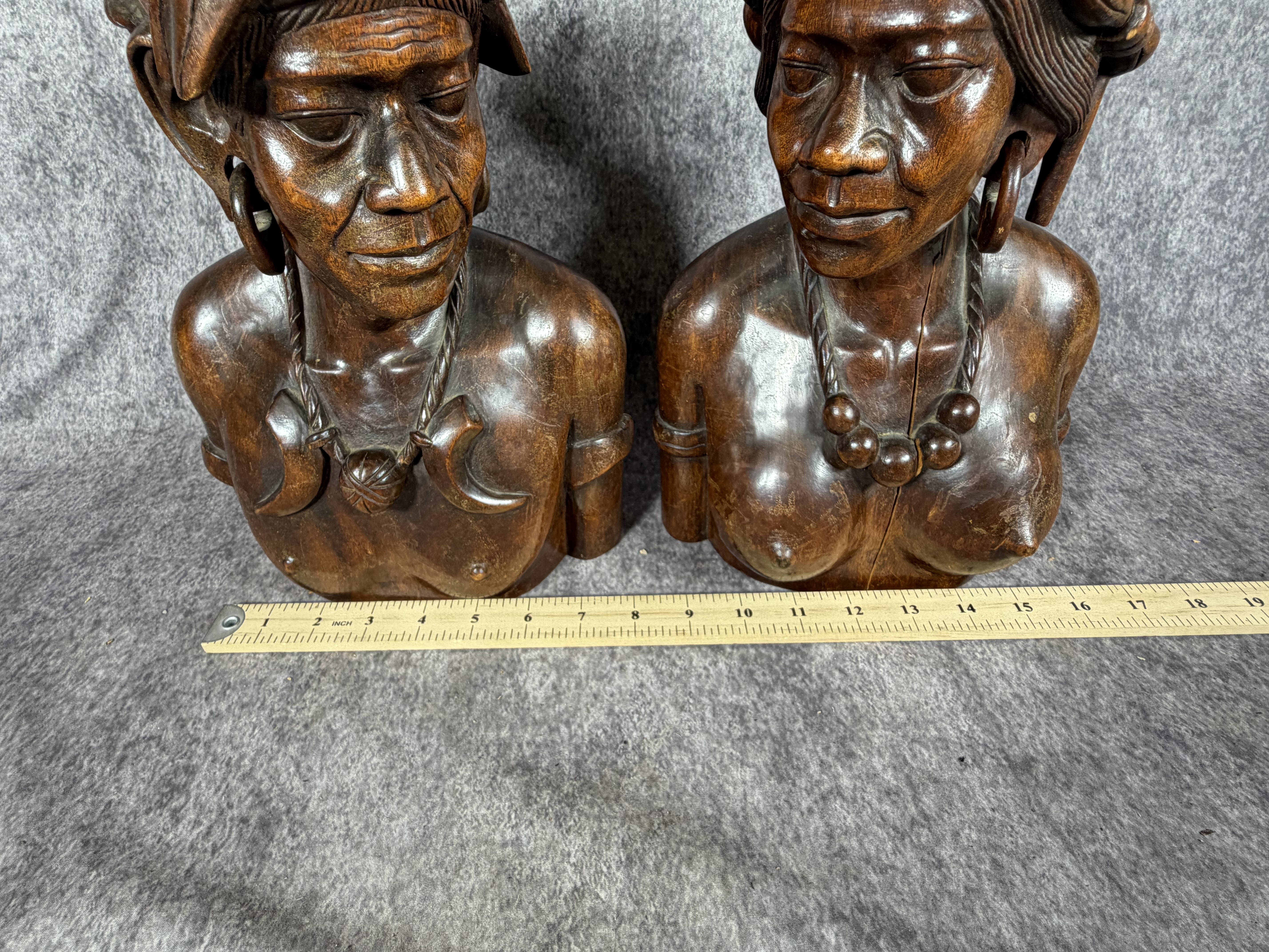 A Pair of Carved Hardwood Tribal Busts in the Style of Igorot Folk Art