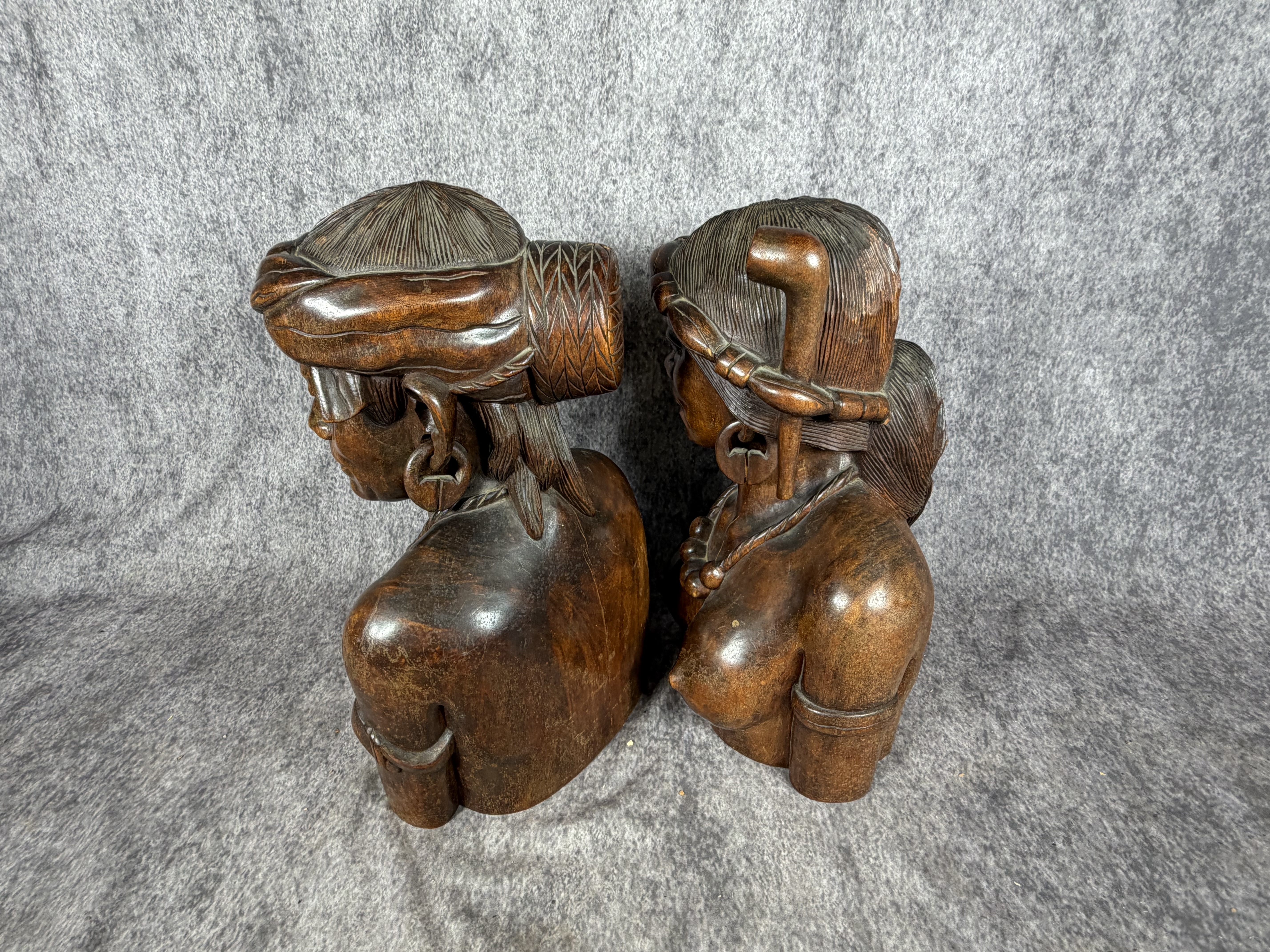 A Pair of Carved Hardwood Tribal Busts in the Style of Igorot Folk Art