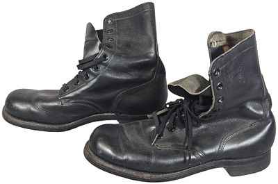 A Pair of Vintage Military Style Black Leather Boots. A pair of black leather boots featuring 