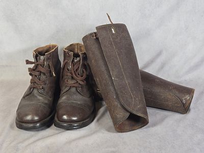 A Pair of Royal Netherlands Army Brown Leather Ankle Boots and Coordinating Gaiters. This lot 