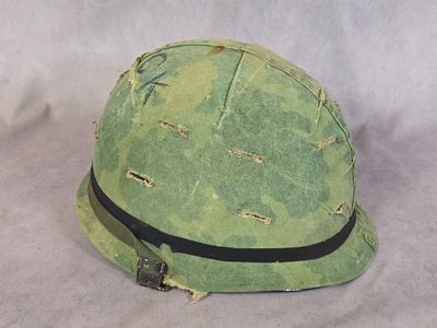 Vietnam War U.S. M1 Steel Combat Helmet with Named Mitchell Pattern Camouflage Cover. Vietnam 