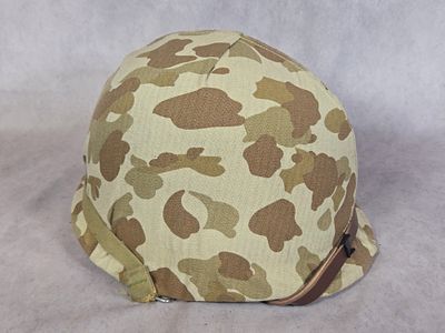 WWII USMC M1 Fixed-Bale Helmet with First Pattern Camouflage Cover. This is an early-production 