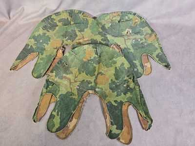 A Trio of US Military M1 Mitchell Pattern Reversible Helmet Covers. A trio of original United 
