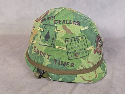 Vietnam War Era U.S. M1 Steel Combat Helmet with Personalized Mitchell Pattern Camouflage Cover. 