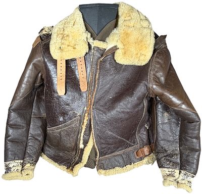 Two US Military Apparel Items: A USAAF Type B-3 Style Flight Jacket and a Modern DSCP Wool Sweater. 