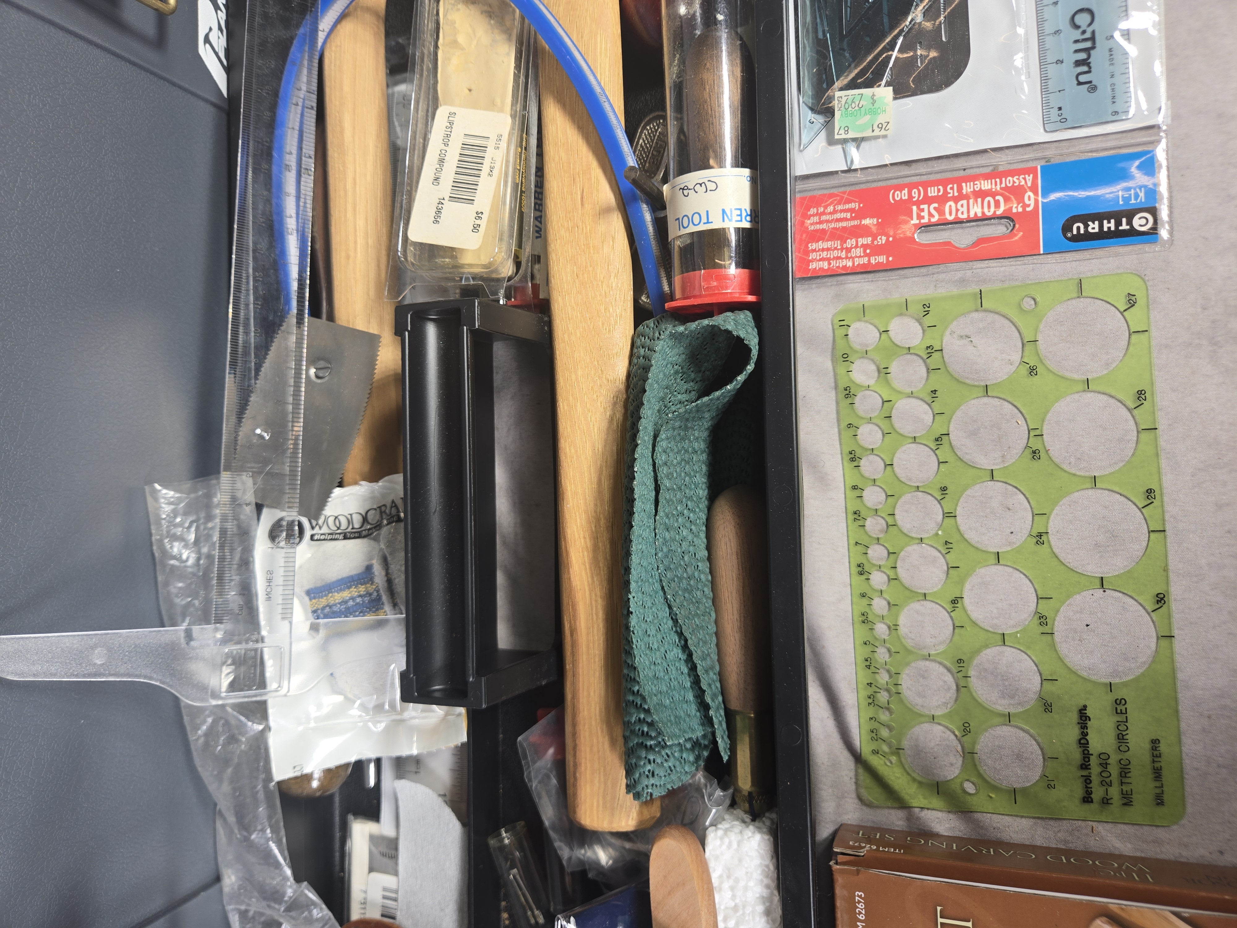 A Collection of Professional and Hobbyist Woodcarving and Woodworking Tools in a Plano Toolbox