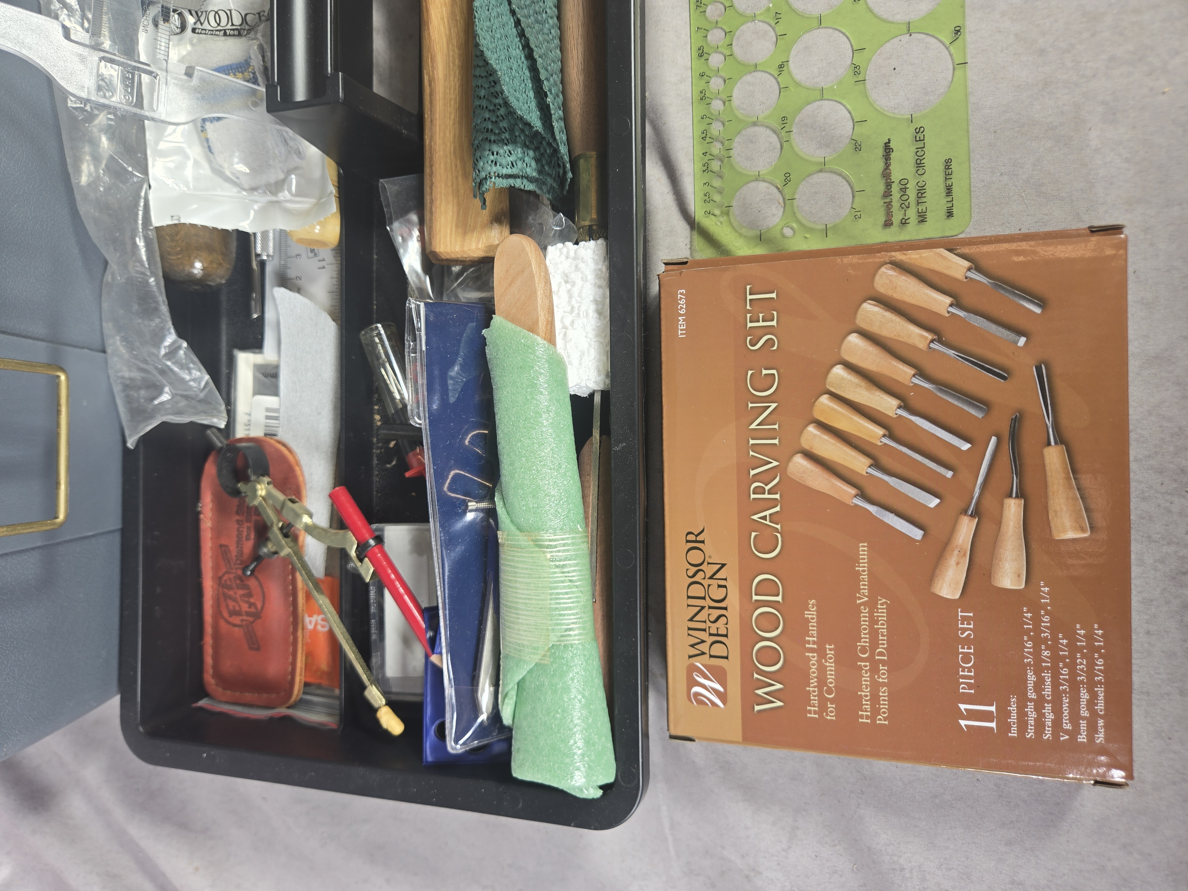 A Collection of Professional and Hobbyist Woodcarving and Woodworking Tools in a Plano Toolbox