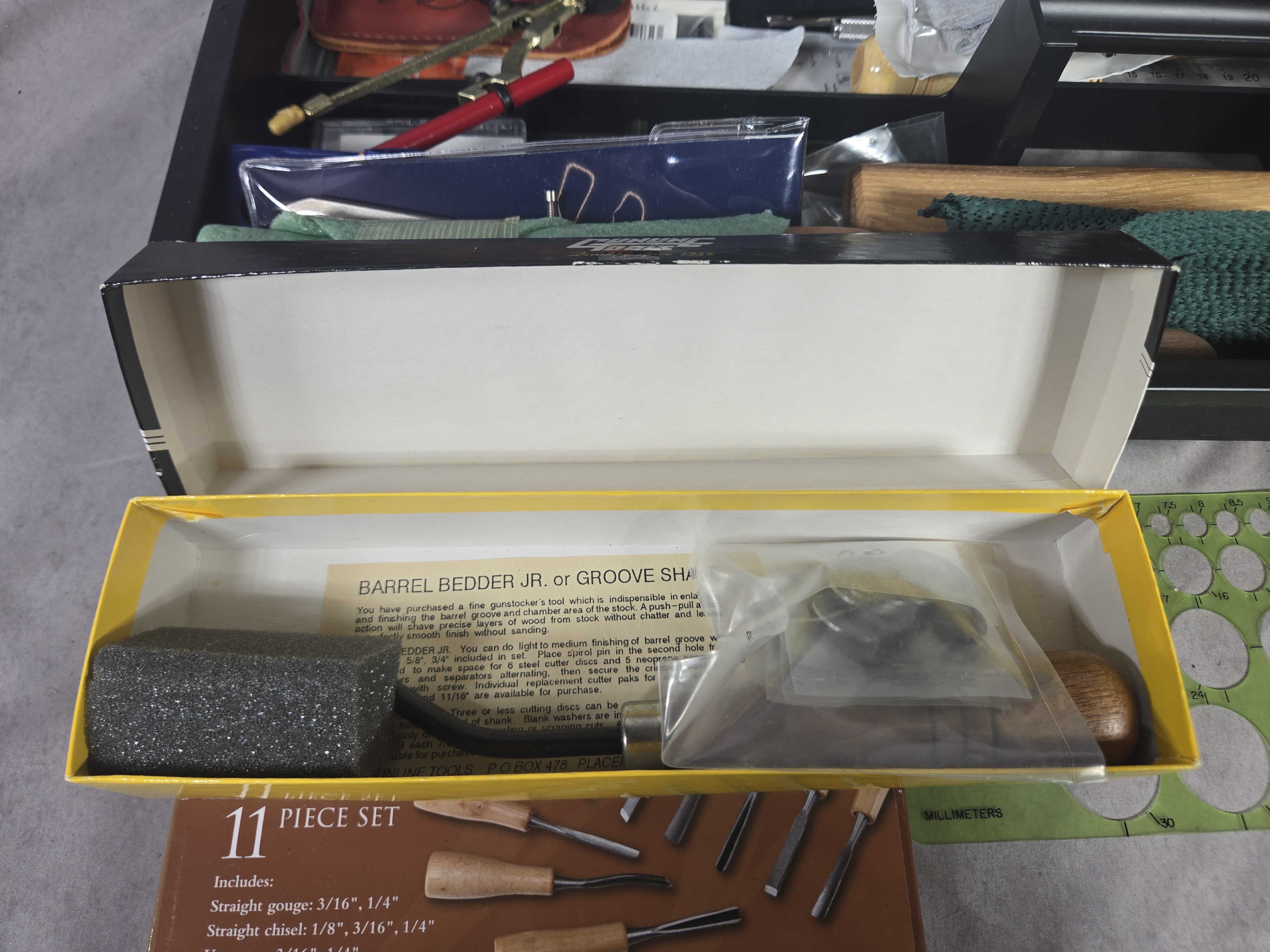 A Collection of Professional and Hobbyist Woodcarving and Woodworking Tools in a Plano Toolbox