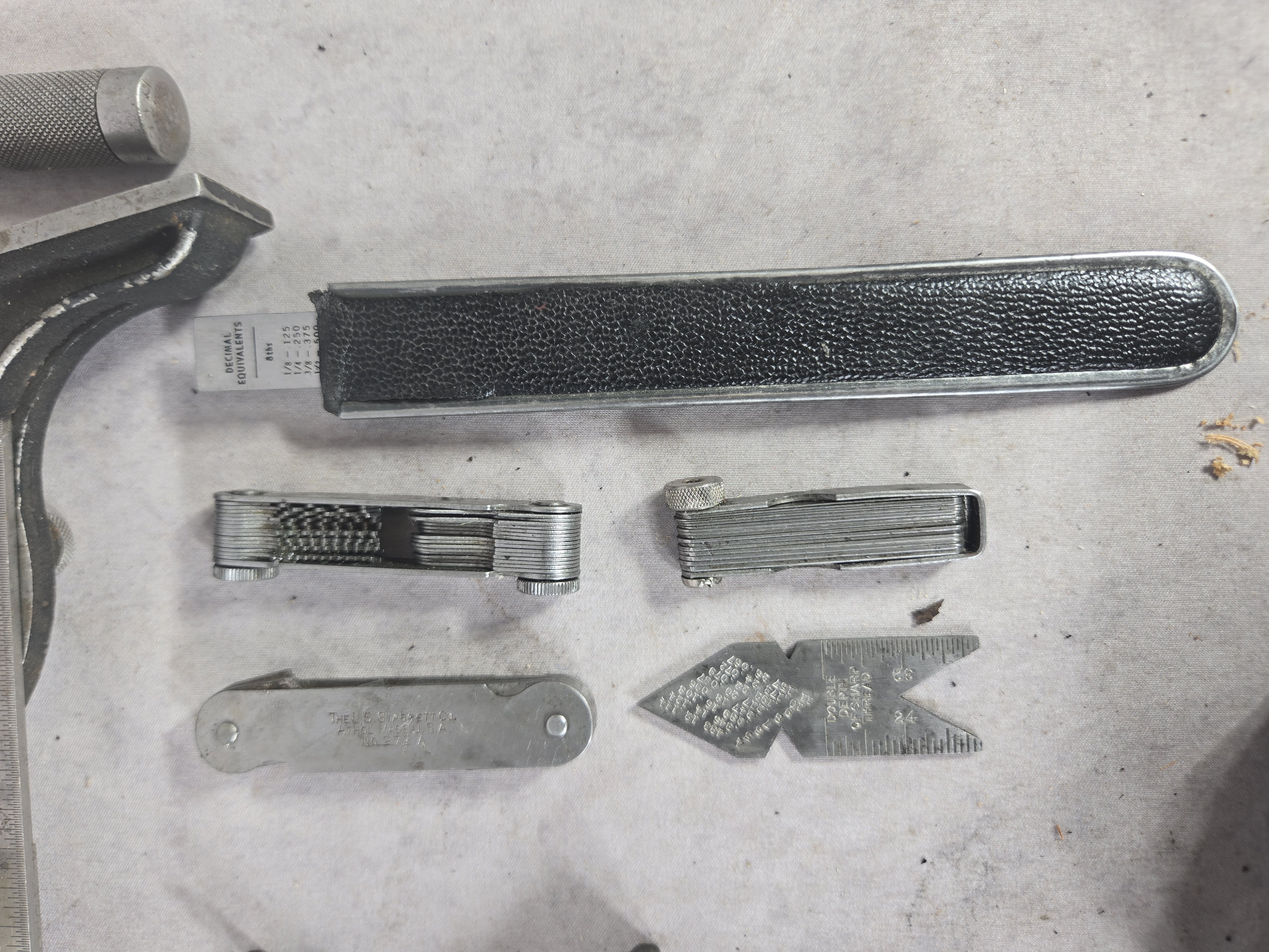 A Collection of Vintage Precision Machinist Measuring and Layout Tools including Brown and Sharpe and L.S. Starrett