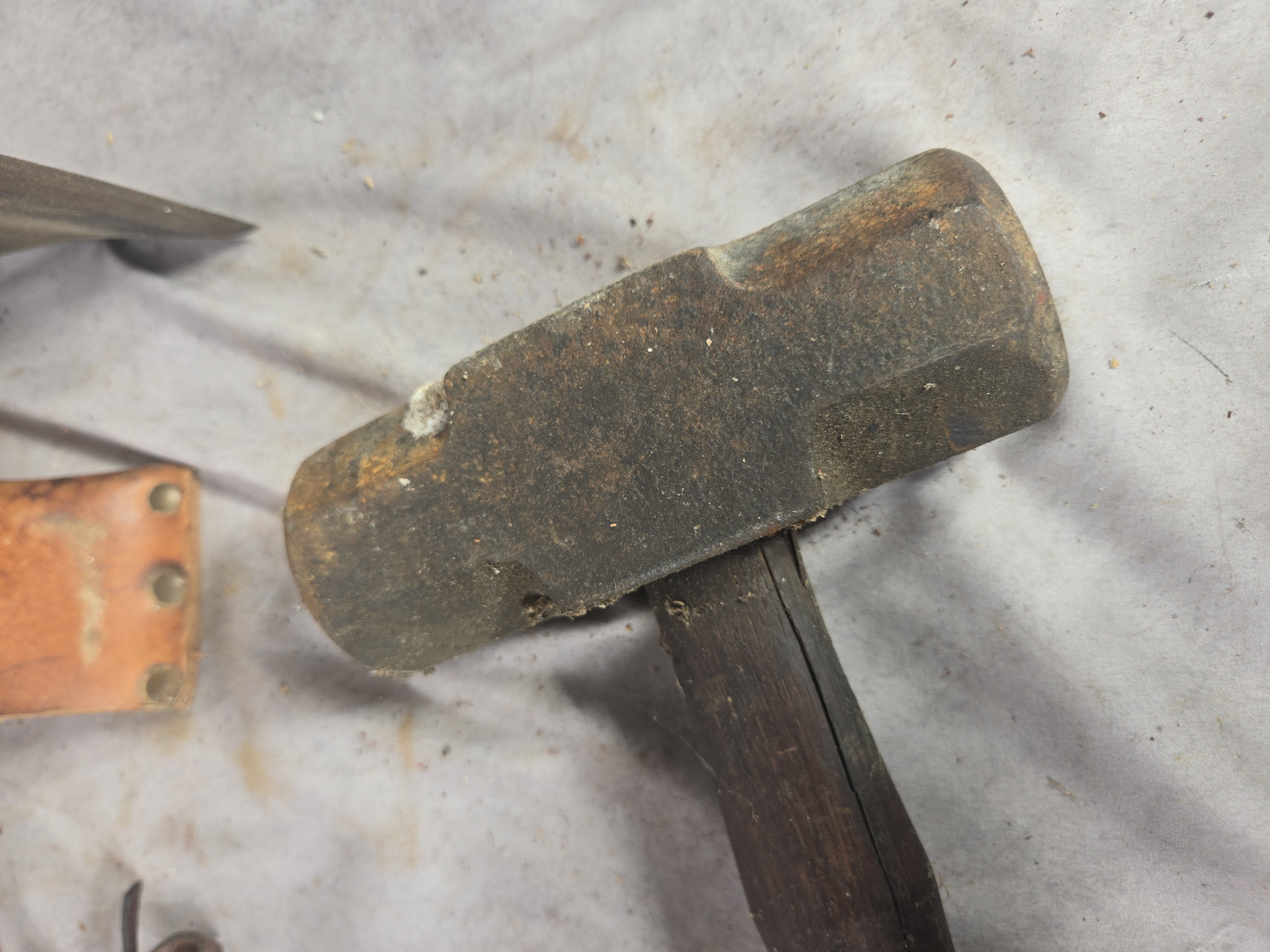 Sledgehammer and a Carpenter's Adze with Leather Sheath