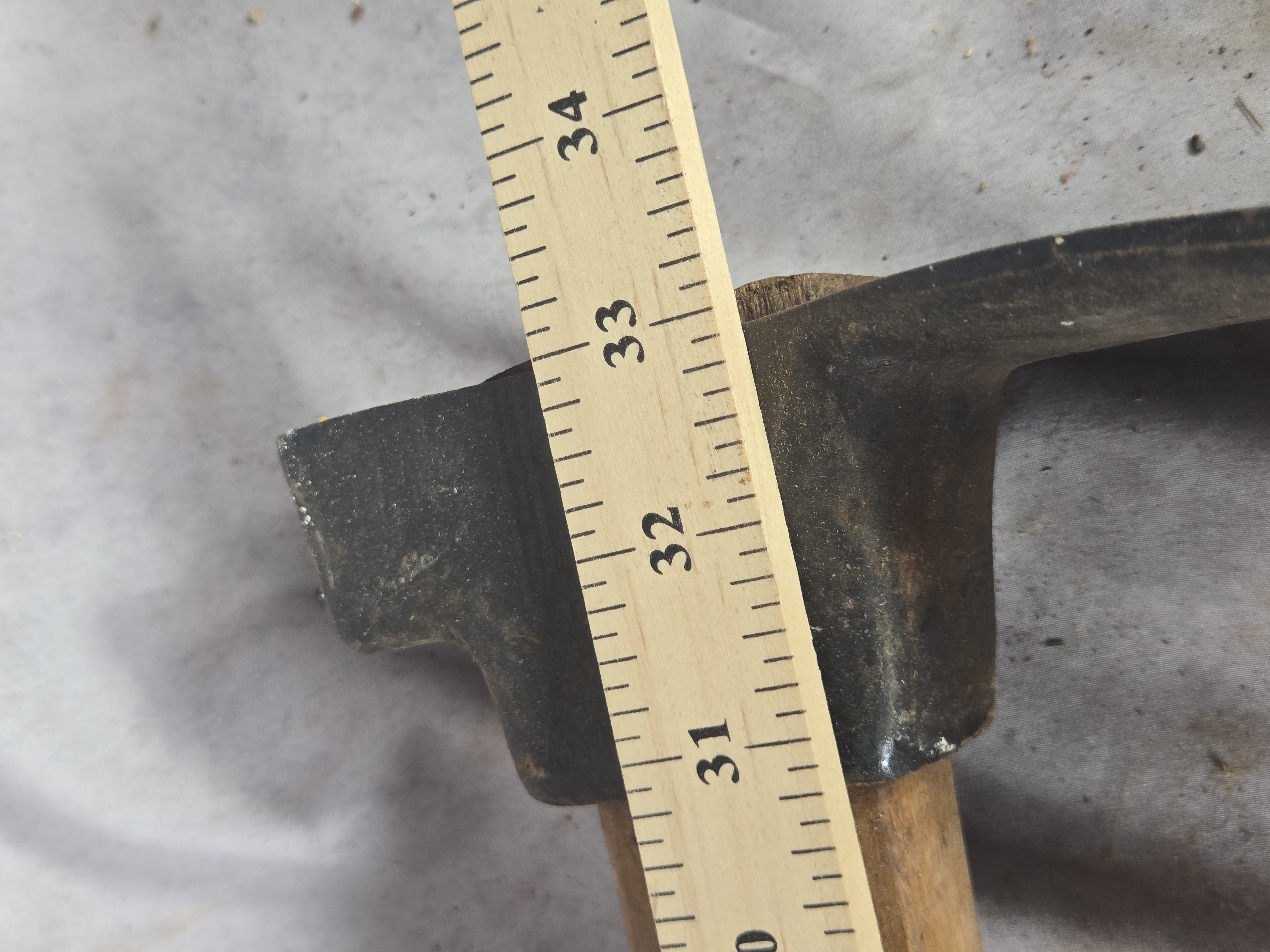 Sledgehammer and a Carpenter's Adze with Leather Sheath