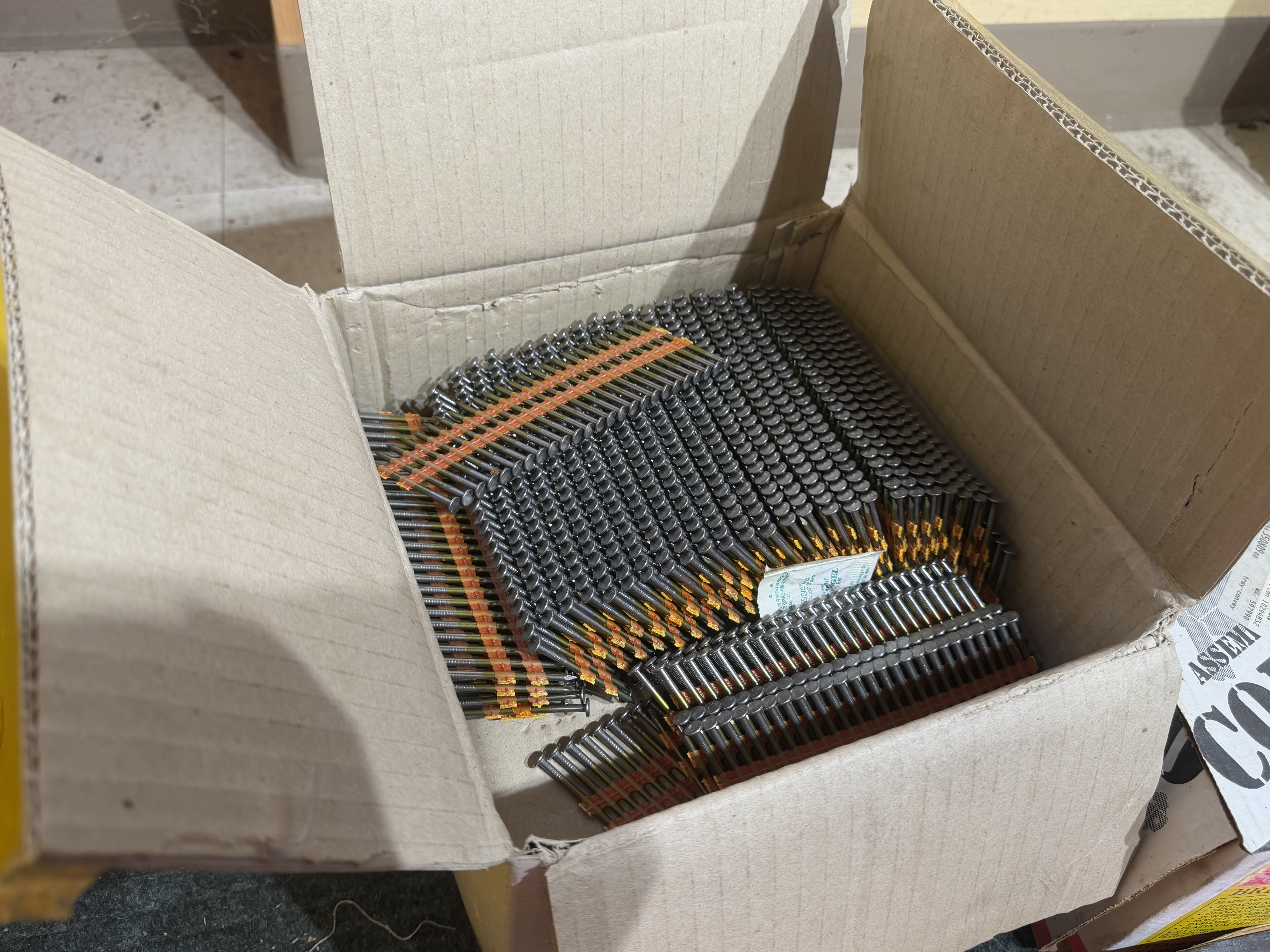 An Assortment of Pneumatic Framing and Finish Nails by Senco, Porter-Cable, and Fas’Ners Unlimited