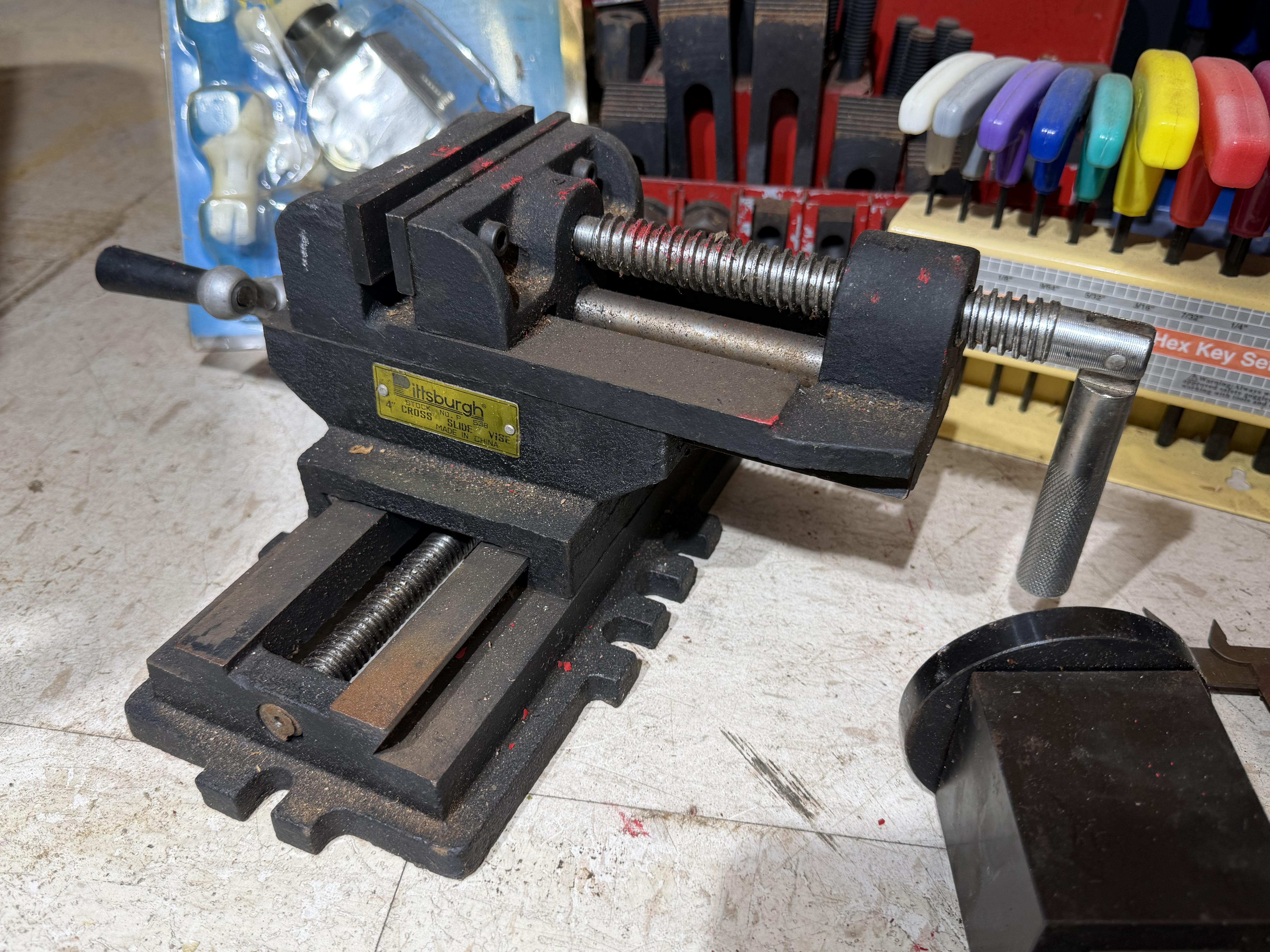 An Assortment of Mill and Lathe Tooling Equipment including a Pittsburgh Cross-Slide Vise and Clamping Kit