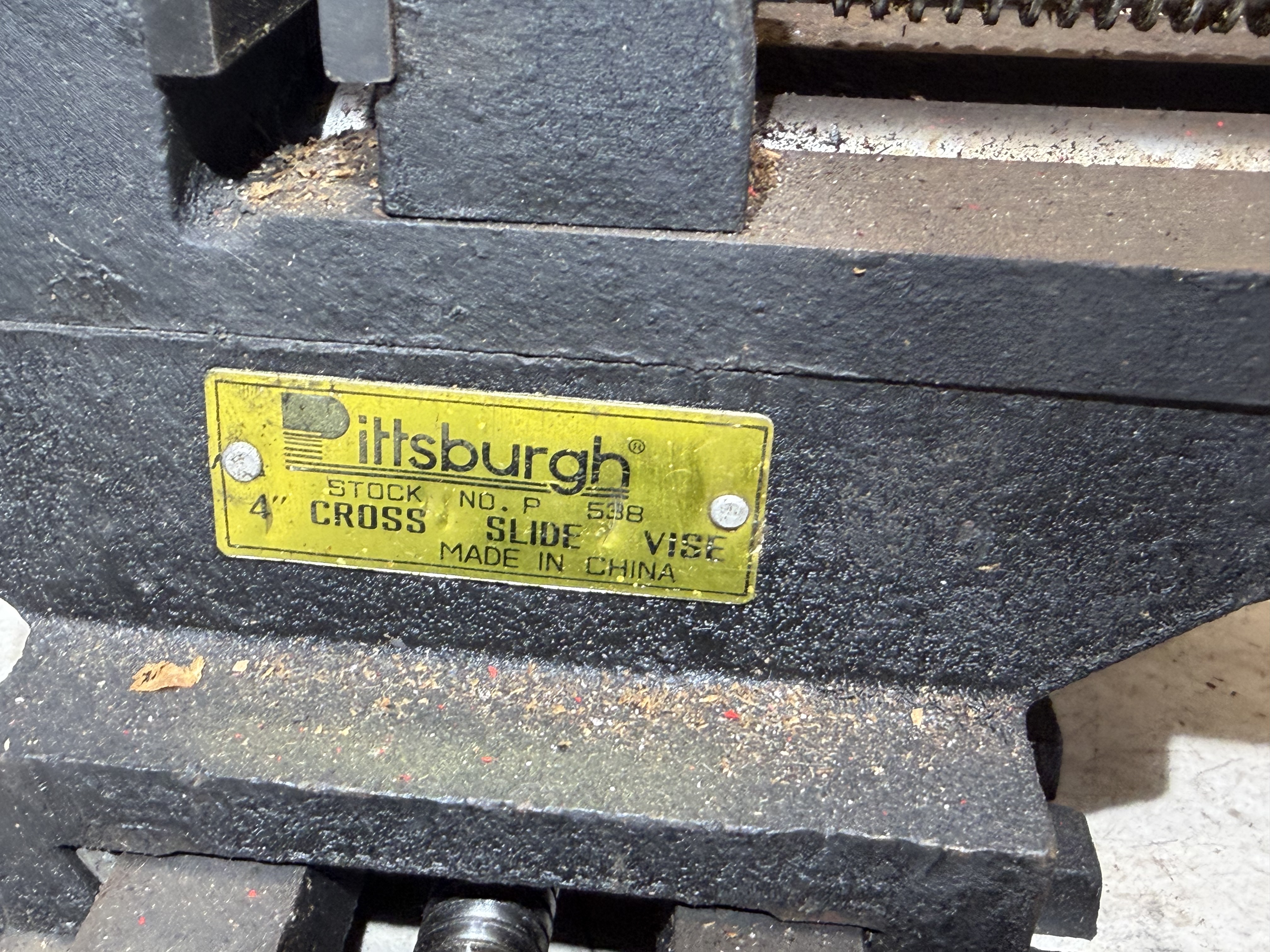 An Assortment of Mill and Lathe Tooling Equipment including a Pittsburgh Cross-Slide Vise and Clamping Kit