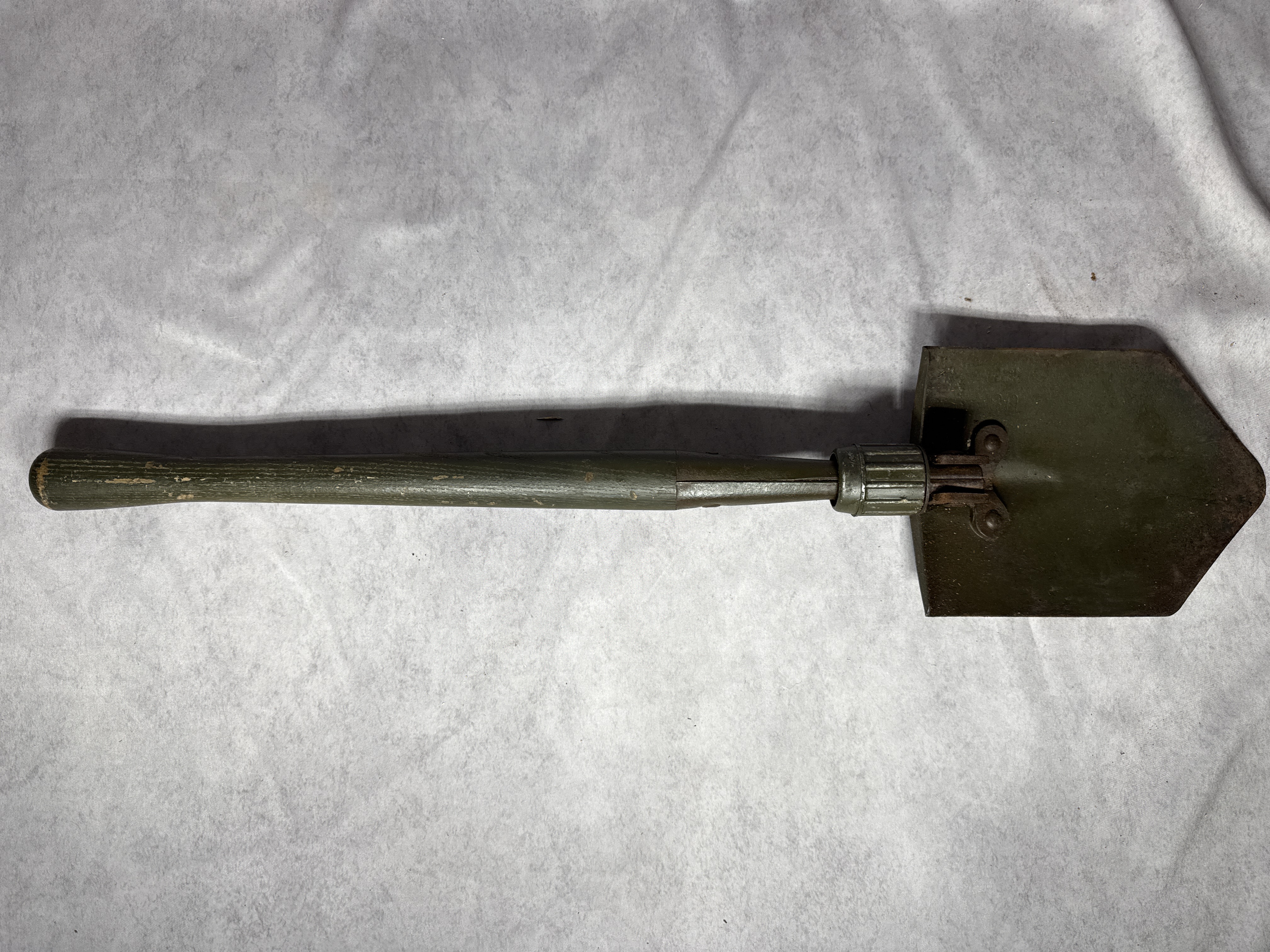 Two US Military Field Tools Including M1943 Folding Entrenching Tool and Pick-Mattock with Carriers