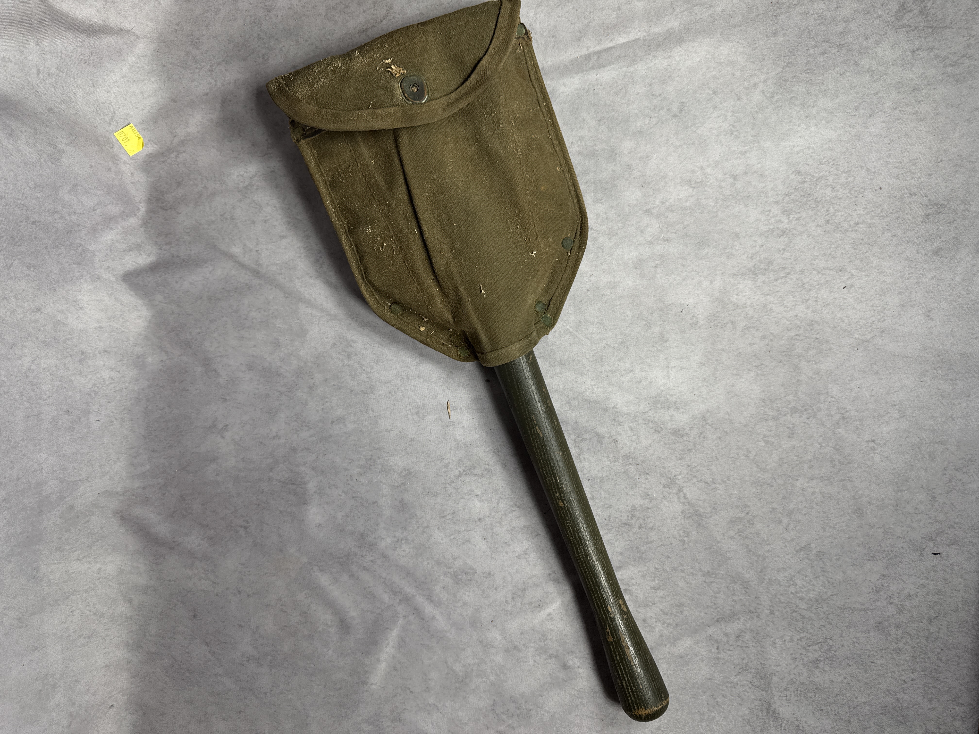 Two US Military Field Tools Including M1943 Folding Entrenching Tool and Pick-Mattock with Carriers