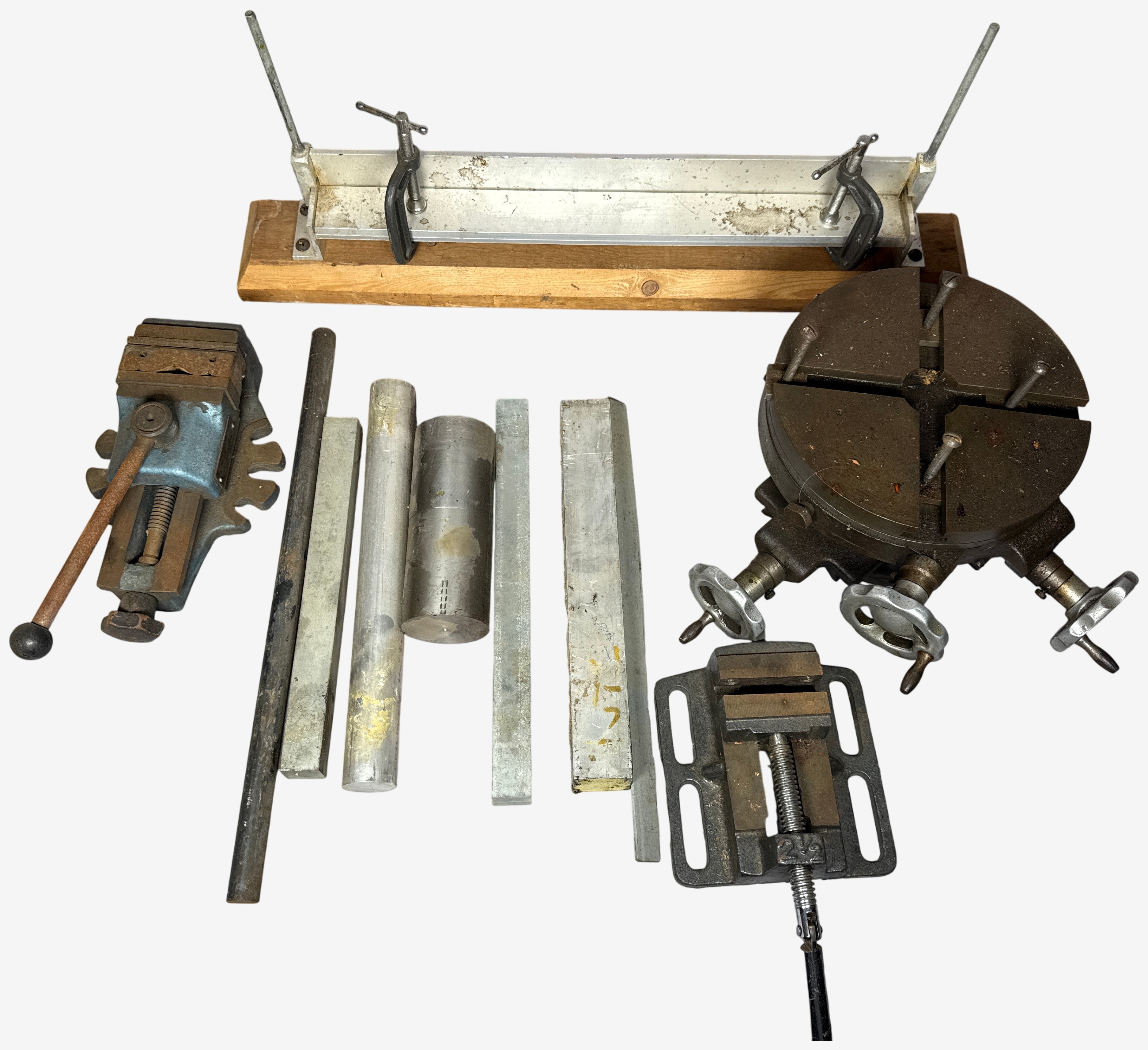 An Assortment of Industrial Metalworking Tools and Machining Stock