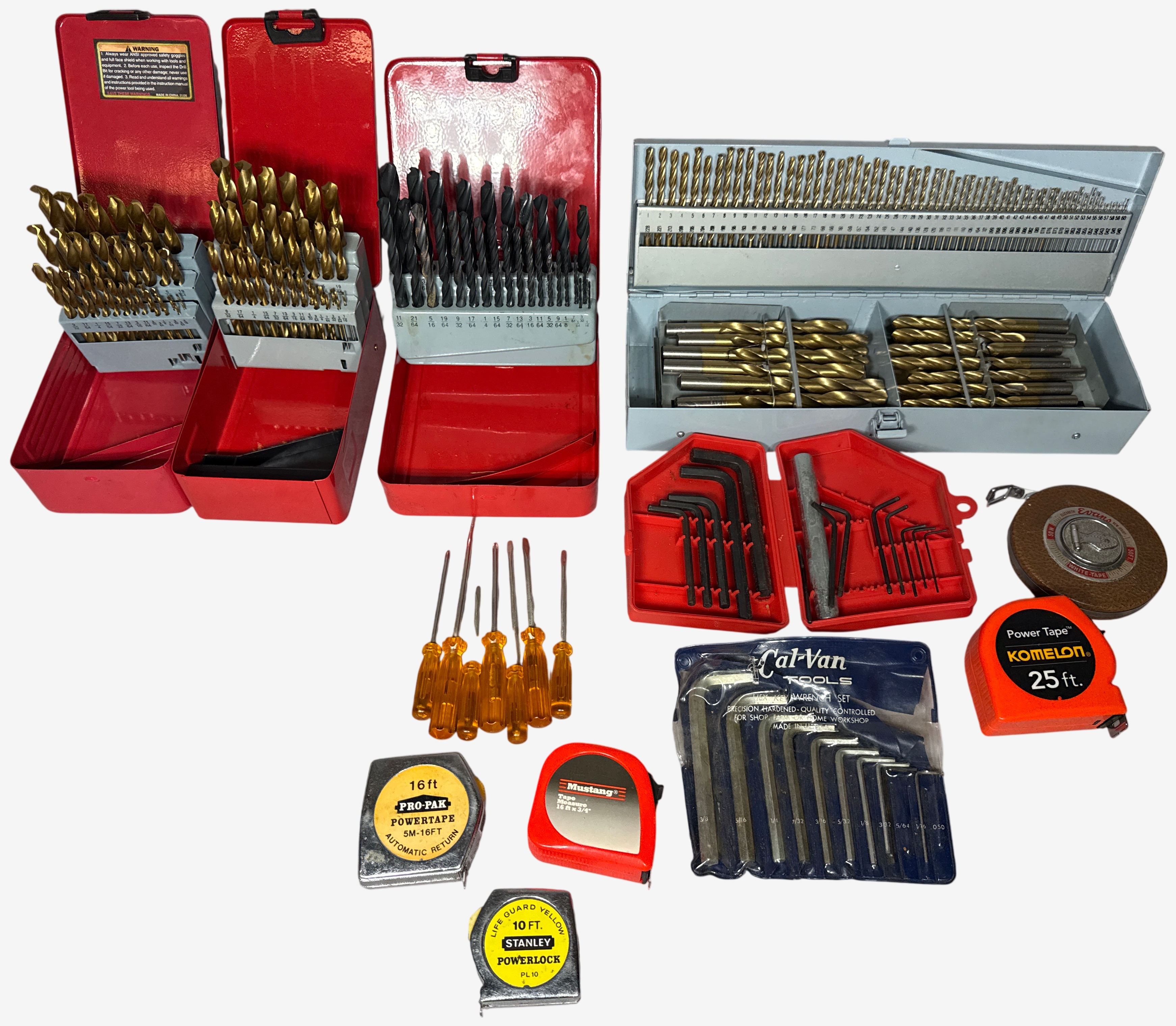 An Assortment of Workshop Hand Tools Including Drill Bit Sets, Hex Keys, and Tape Measures