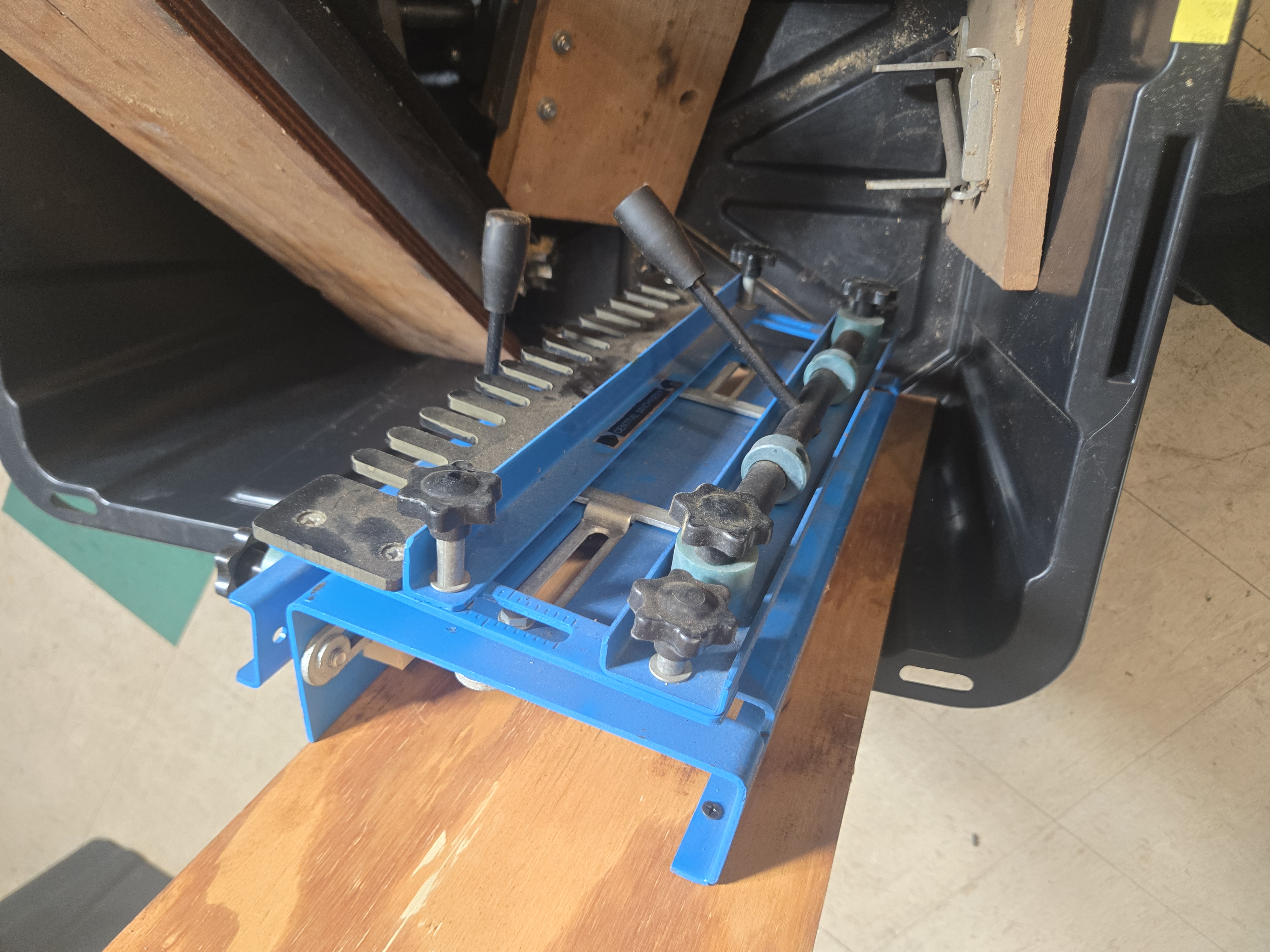 An Assortment of Woodworking Joinery Jigs and Workshop Accessories Including a Central Machinery Dovetail Jig