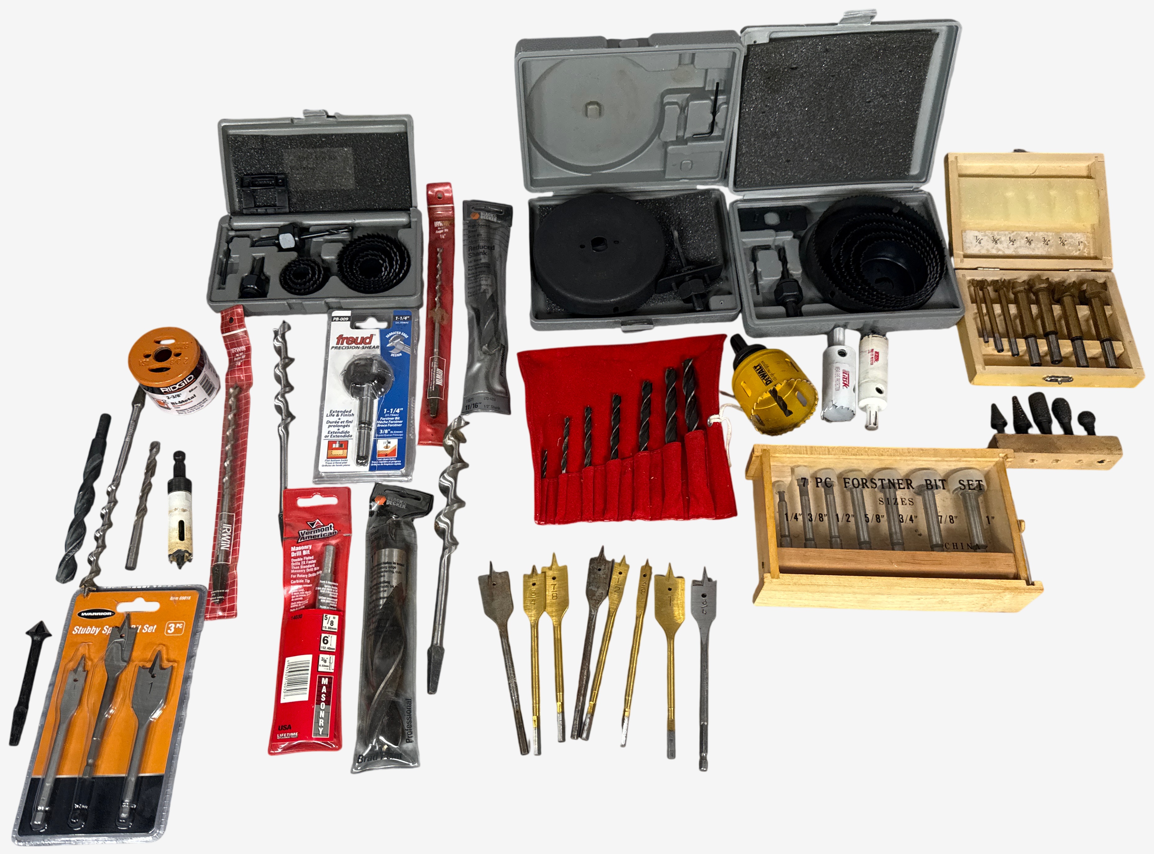 An Assortment of Drilling and Boring Tools Including Hole Saws and Bit Sets
