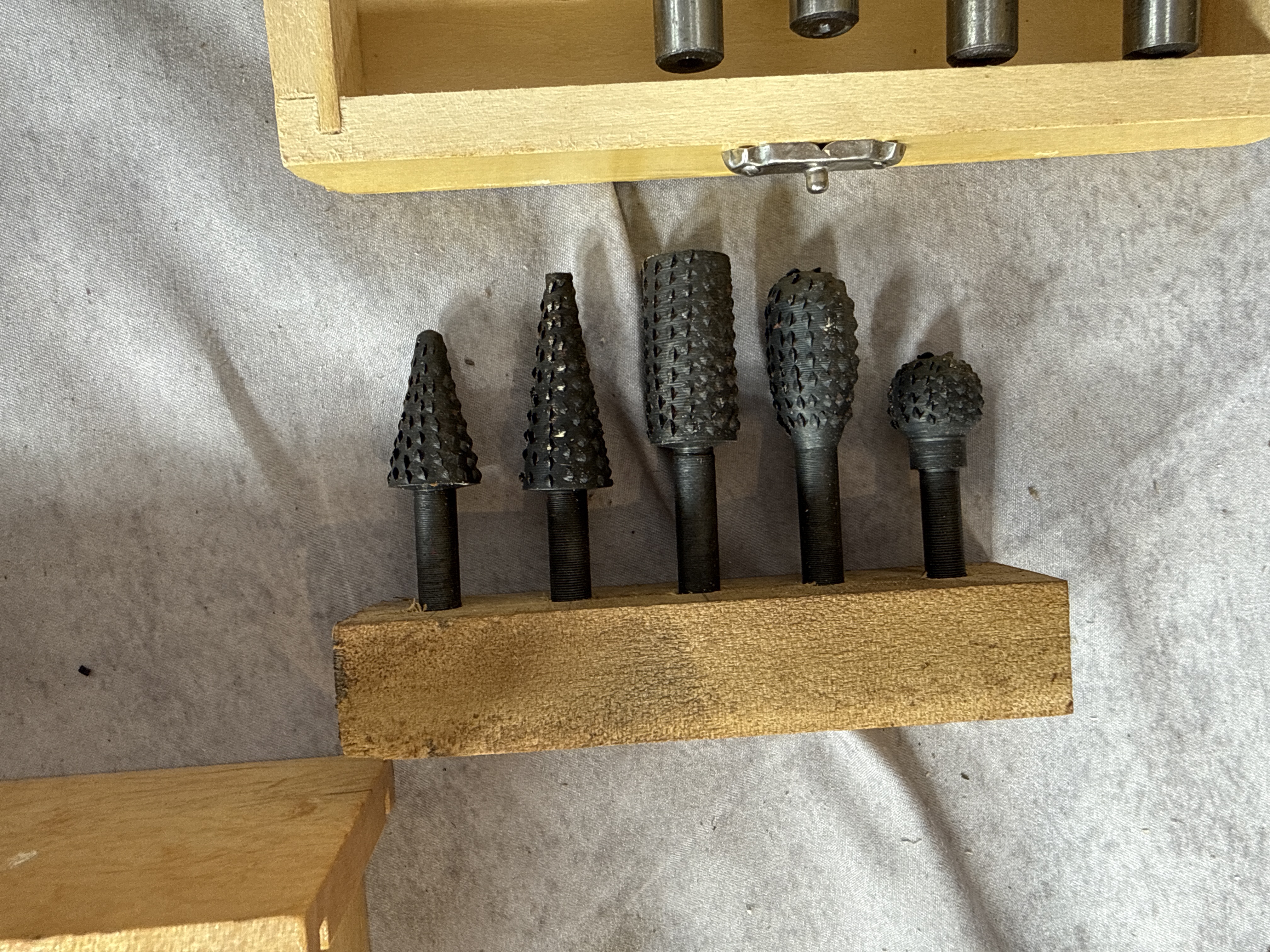 An Assortment of Drilling and Boring Tools Including Hole Saws and Bit Sets