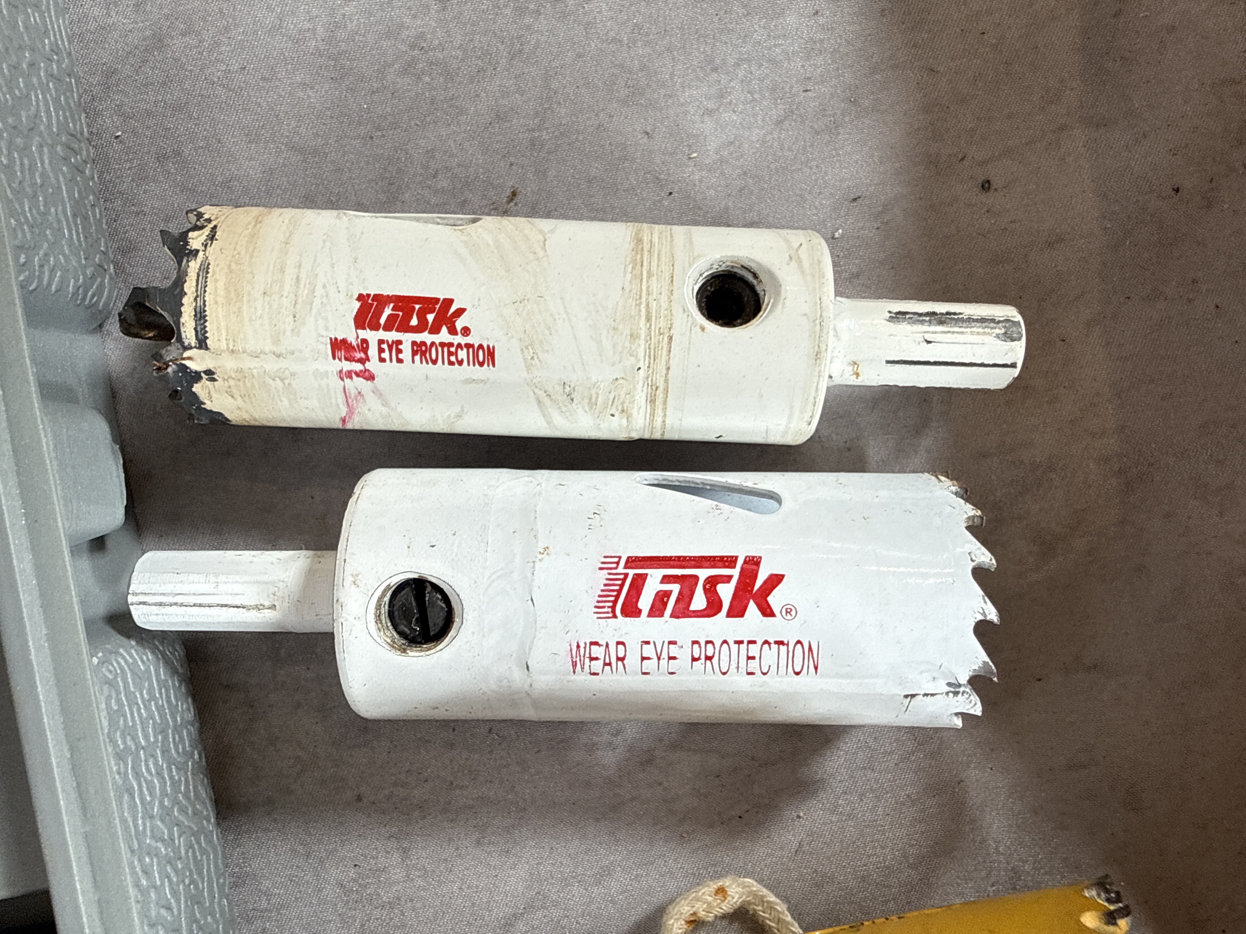 An Assortment of Drilling and Boring Tools Including Hole Saws and Bit Sets