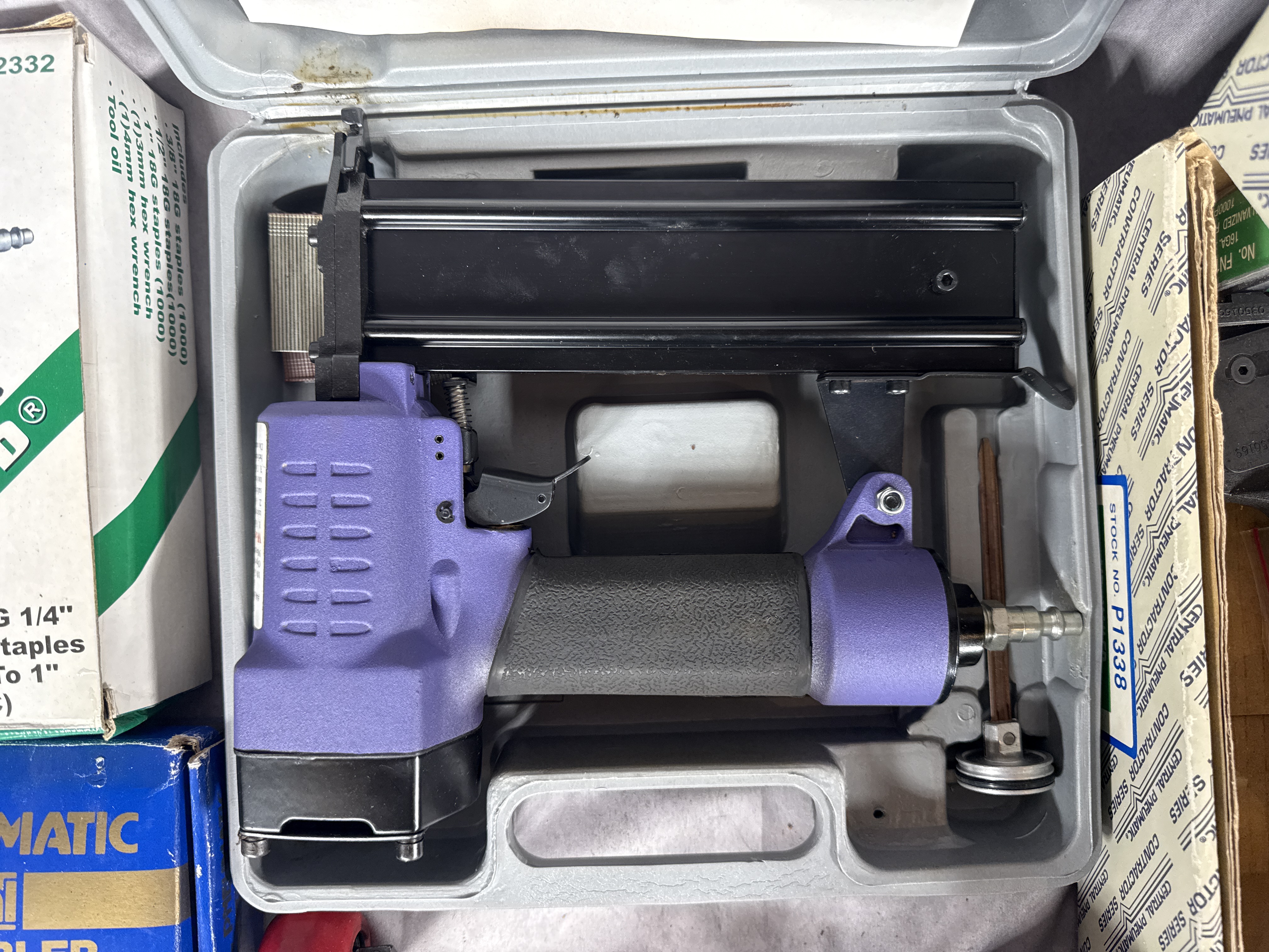 An Assortment of Pneumatic Power Tools and Accessories Including Central Pneumatic, Blue-Point, and Marki