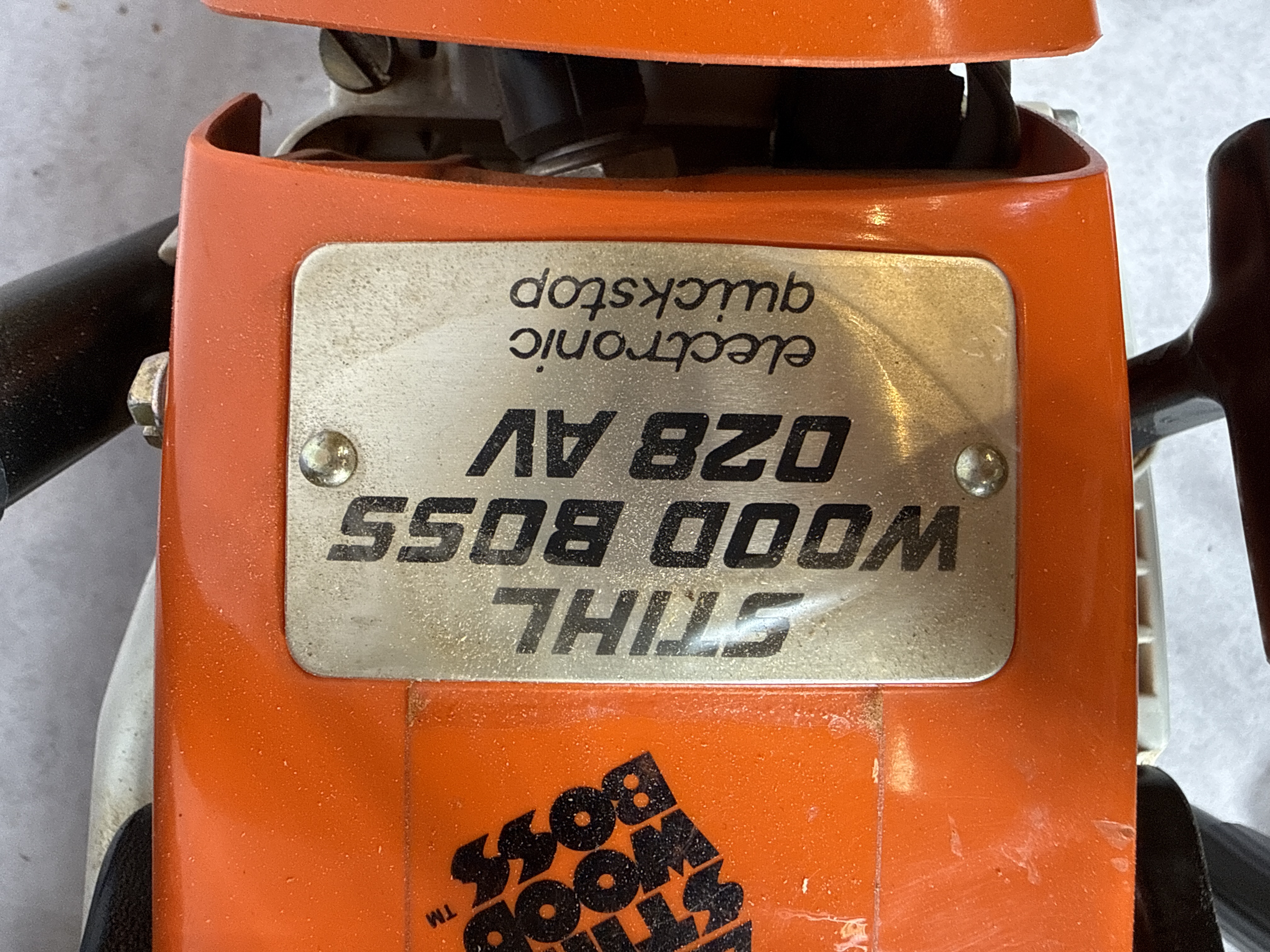 Stihl Wood Boss 028 AV Gas-Powered Chainsaw and a Group of Accessories