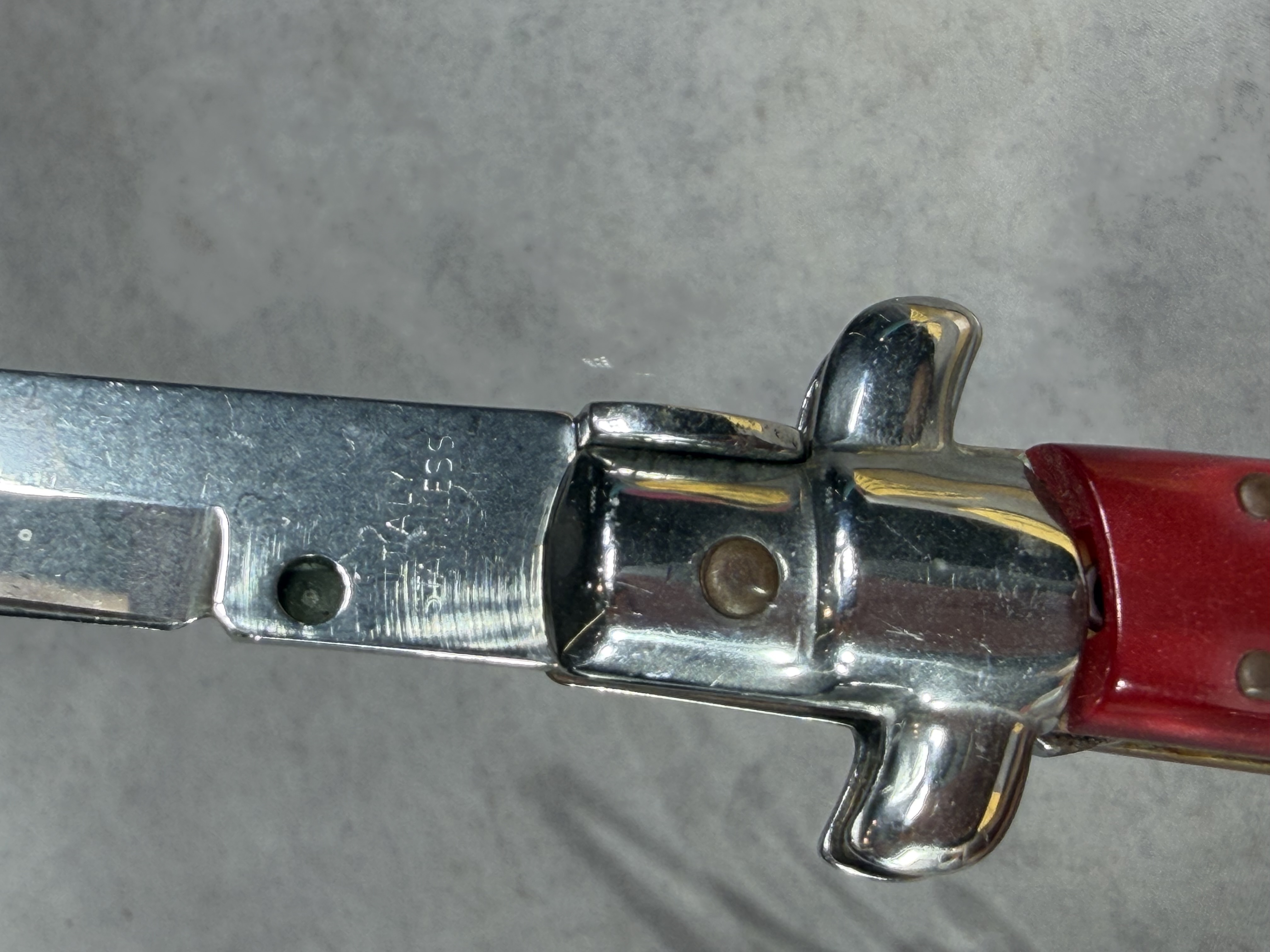 Italian Automatic Stiletto Folding Knife with Red Pearlescent Scales
