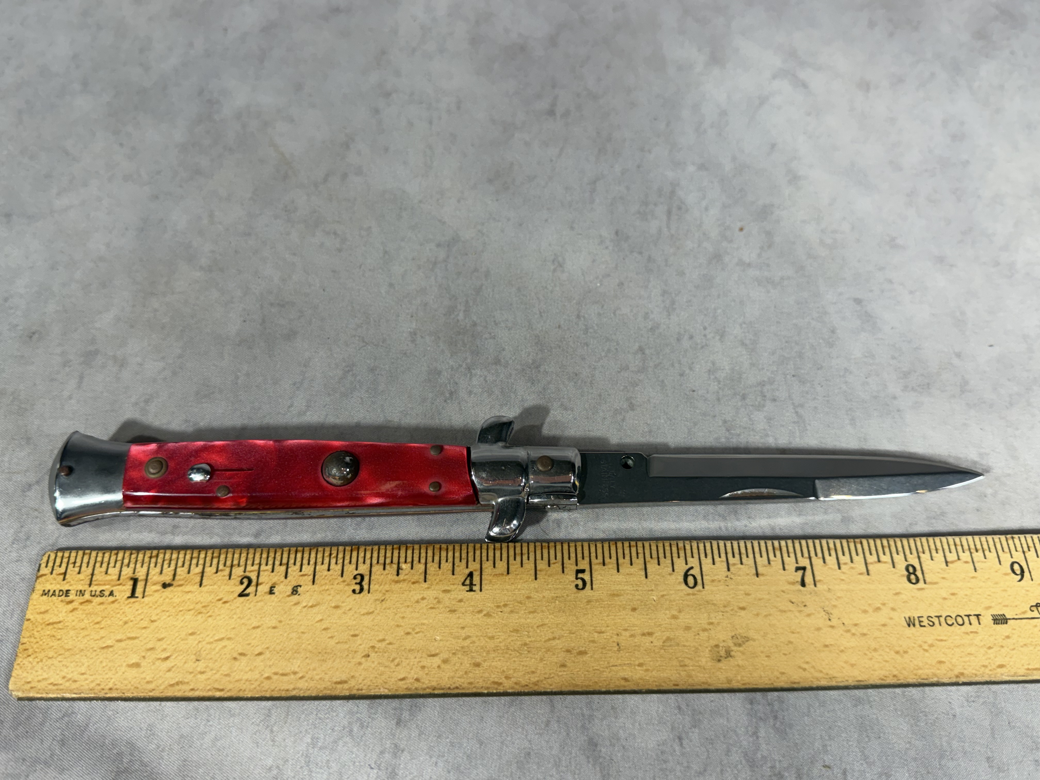 Italian Automatic Stiletto Folding Knife with Red Pearlescent Scales