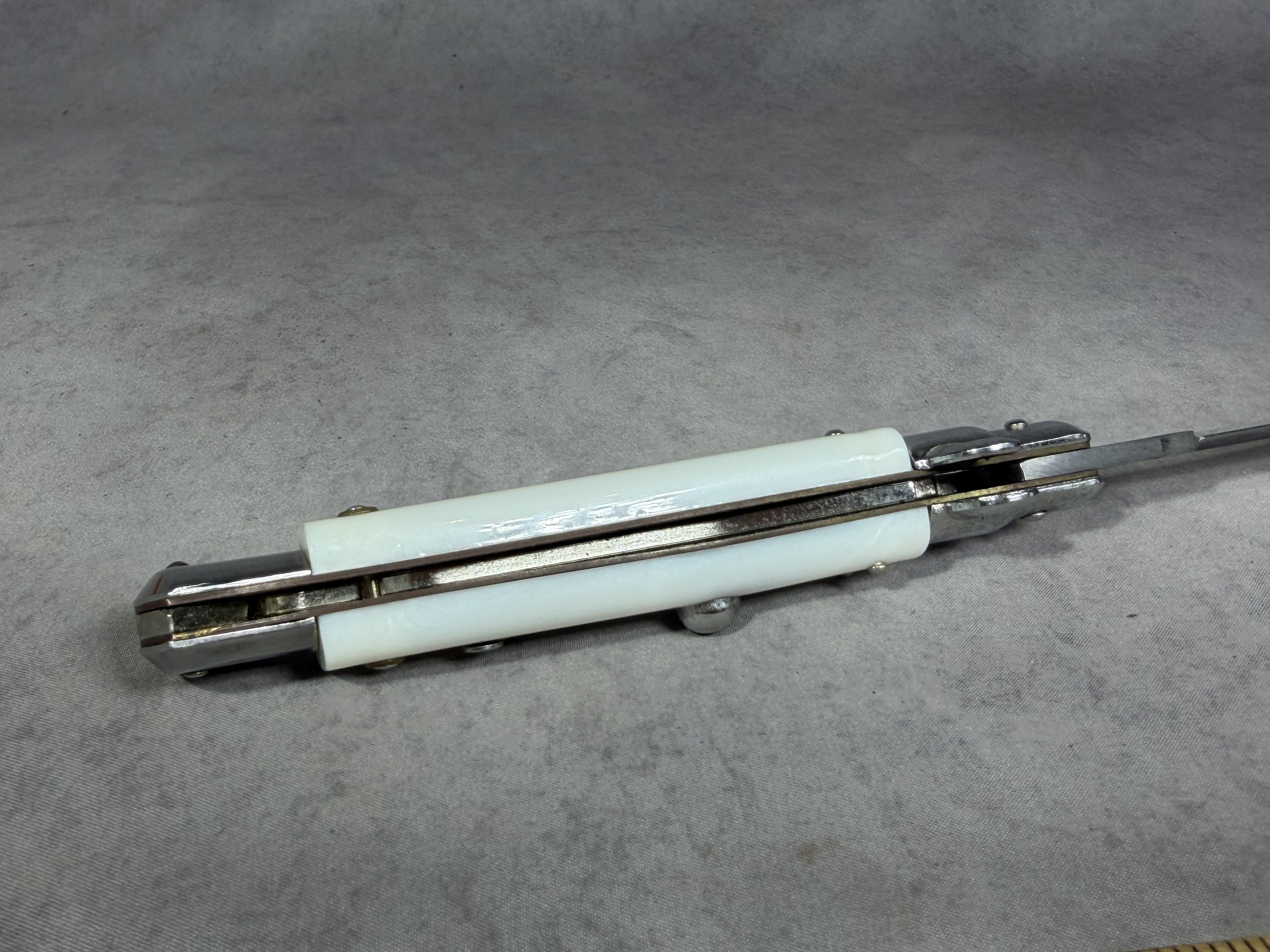 Kissing Crane Italian Style Stiletto Automatic Knife with White Pearloid Handle