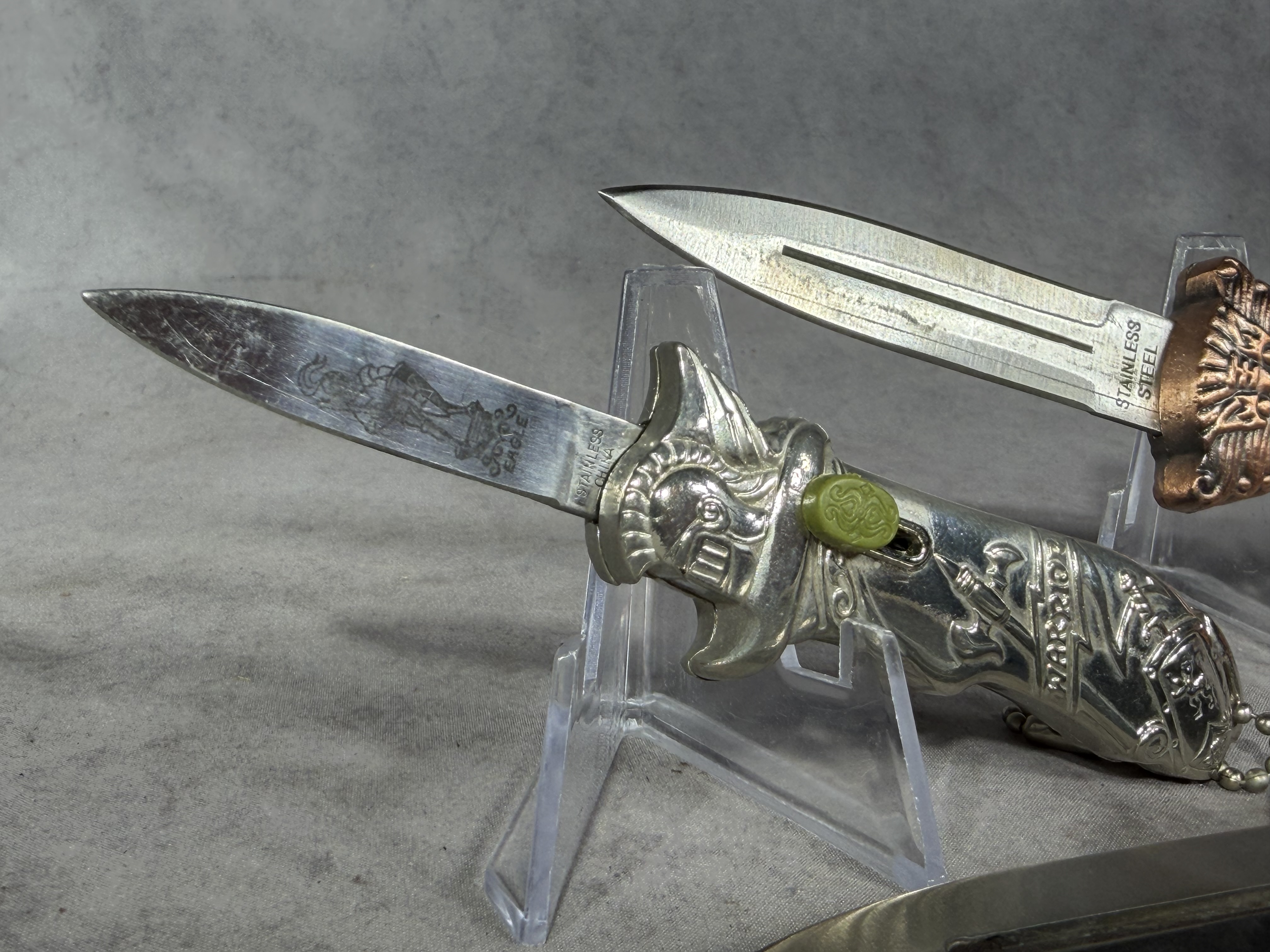 Three OTF Automatic Knives Including Solo Eagle Warrior and Lion Head Models
