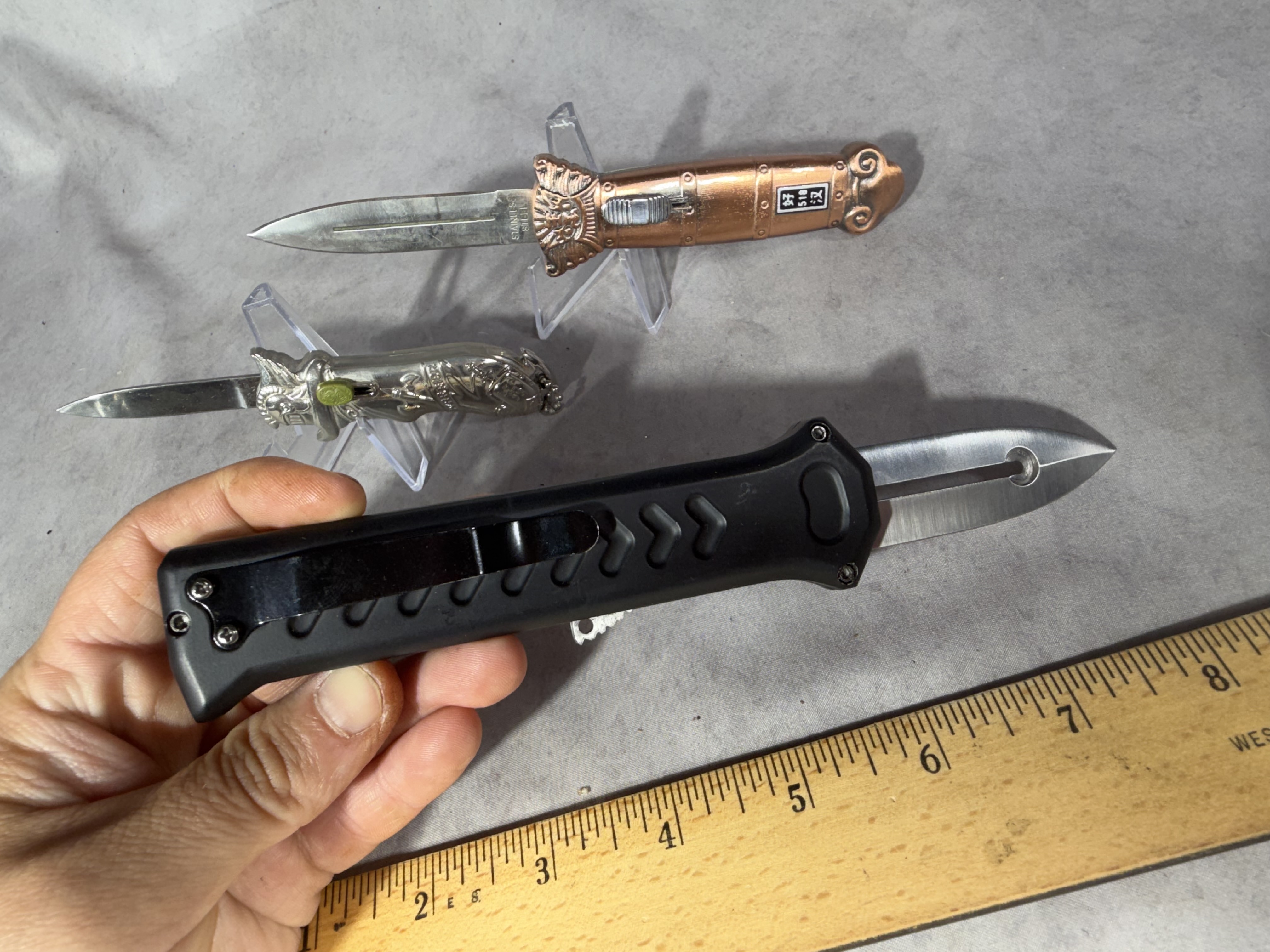 Three OTF Automatic Knives Including Solo Eagle Warrior and Lion Head Models