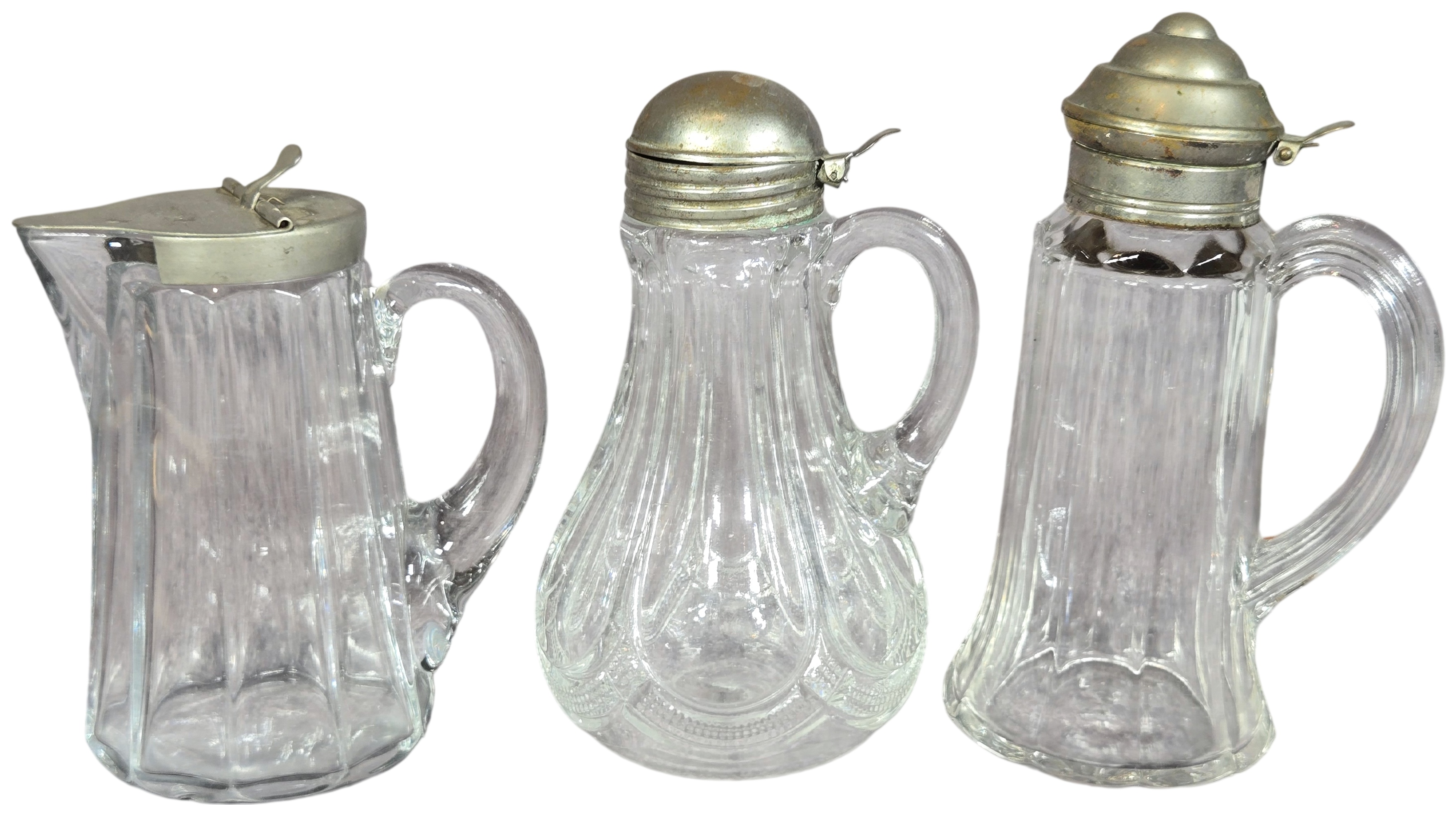 Three Antique Pressed Glass Syrup Pitchers with Metal Lids